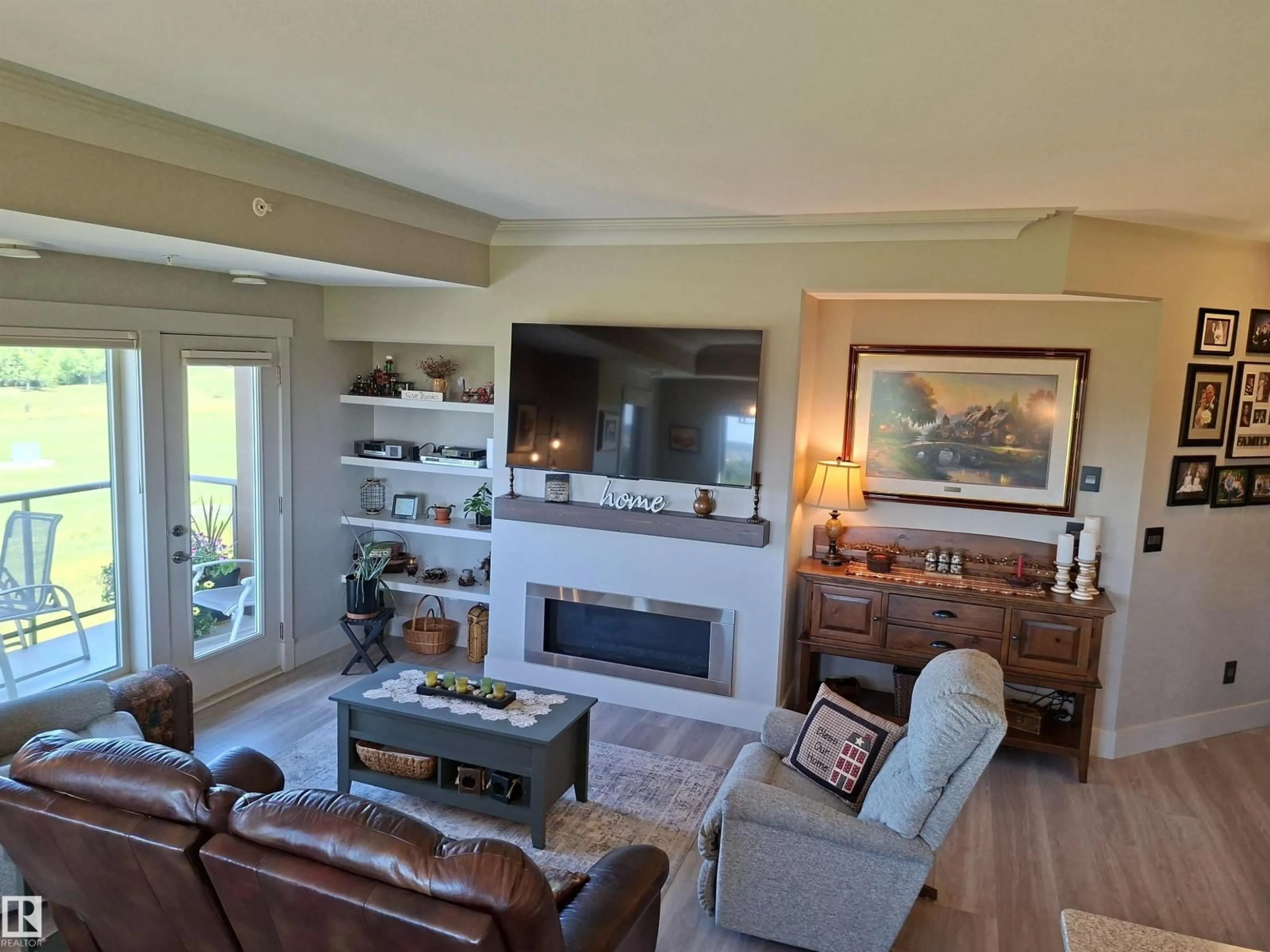 Living room with furniture, unknown for #401 - 5201 BROUGHTAM DR, Drayton Valley Alberta T7A0C8