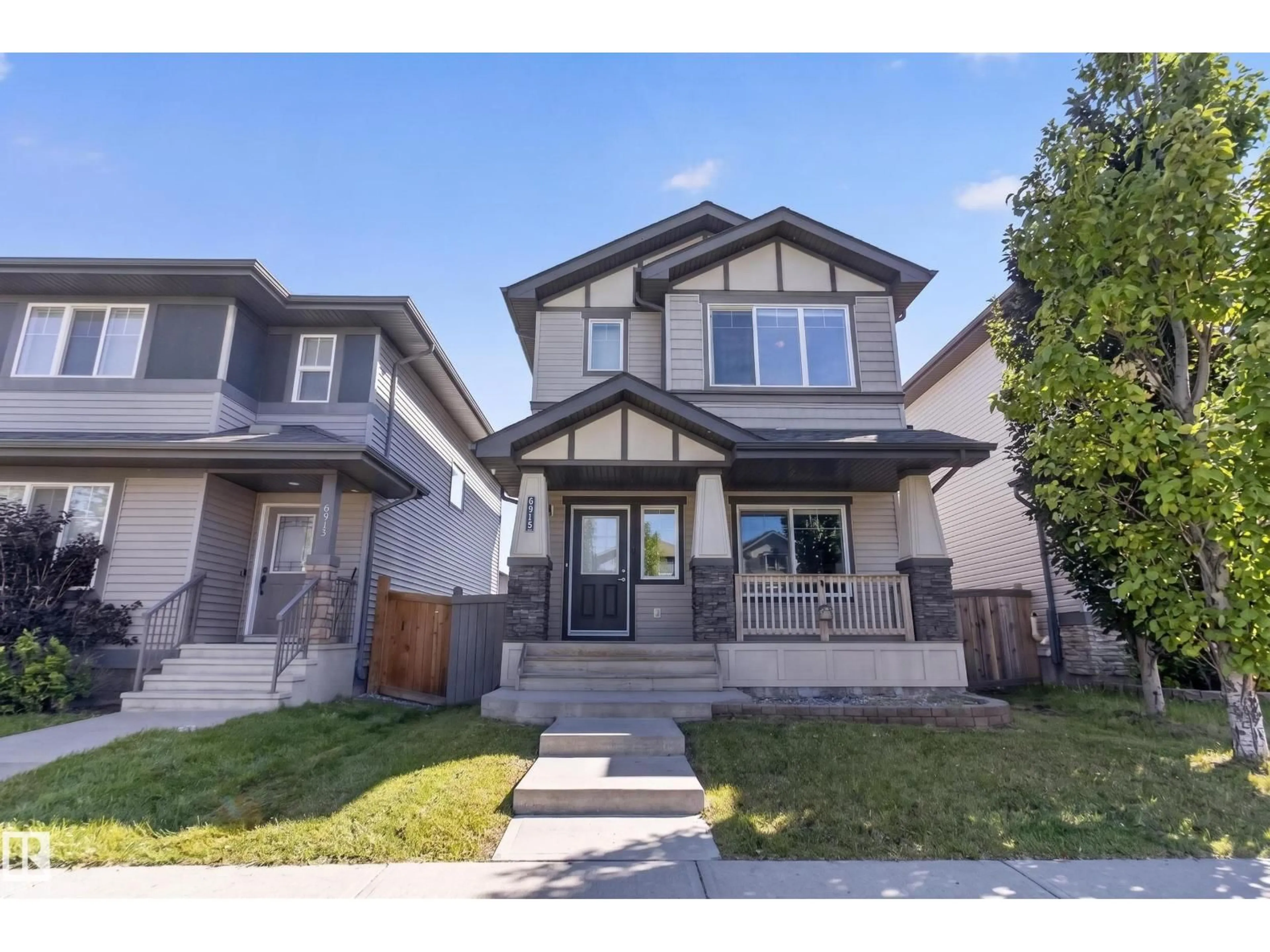 Home with vinyl exterior material, street for 6915 CARDINAL WD, Edmonton Alberta T6W2Y4