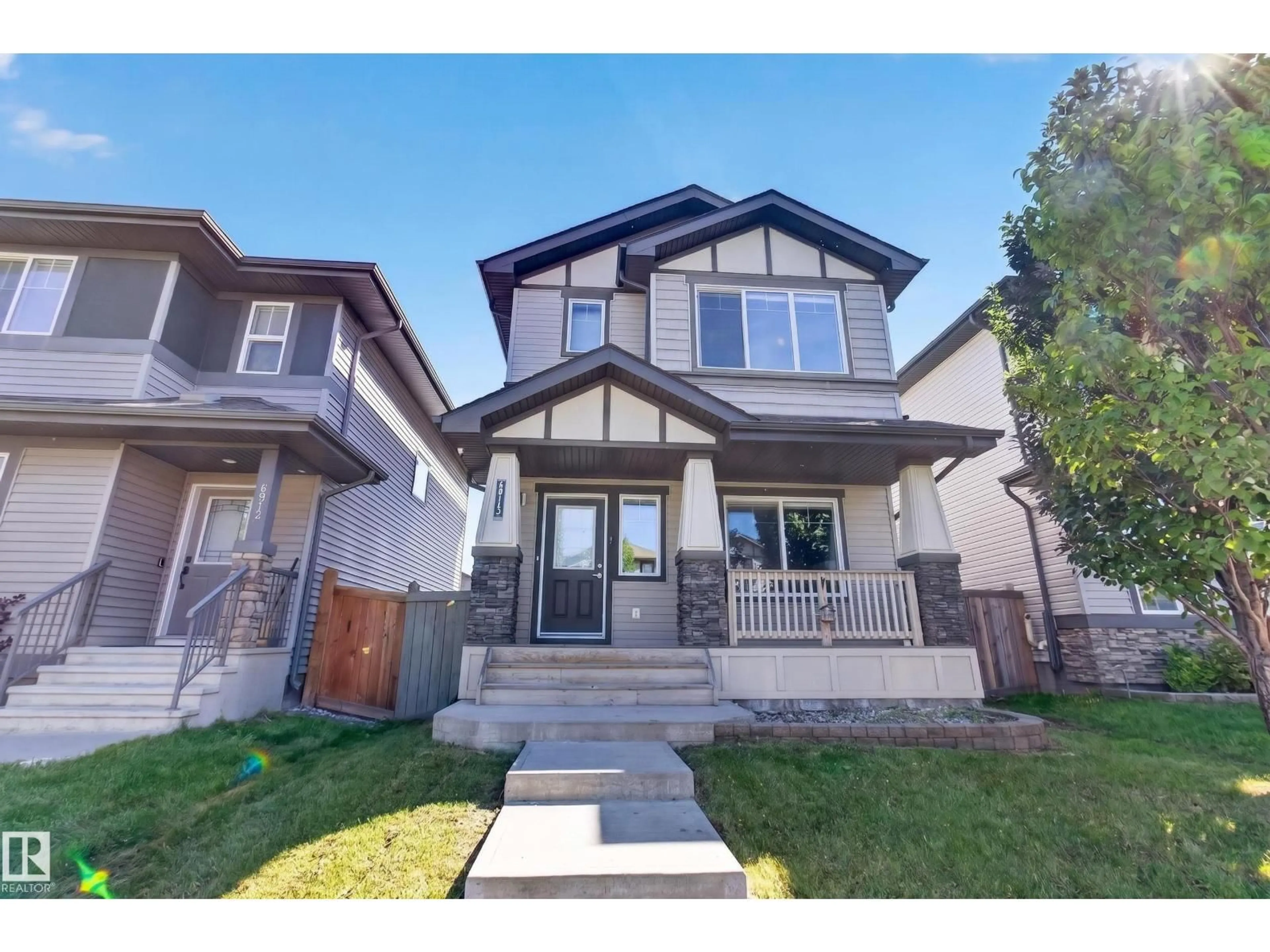 Home with vinyl exterior material, street for 6915 CARDINAL WD, Edmonton Alberta T6W2Y4