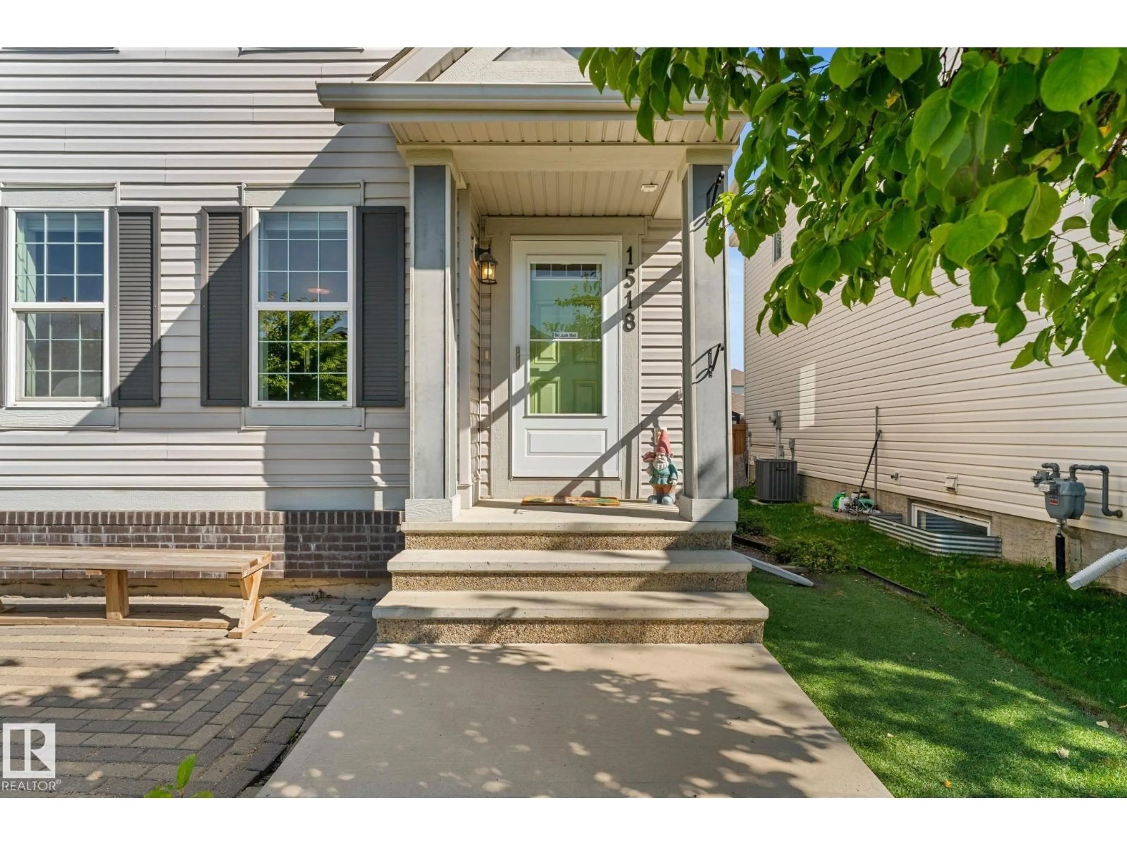 Home with vinyl exterior material, street for 1518 CHAPMAN WY, Edmonton Alberta T6W0Y9