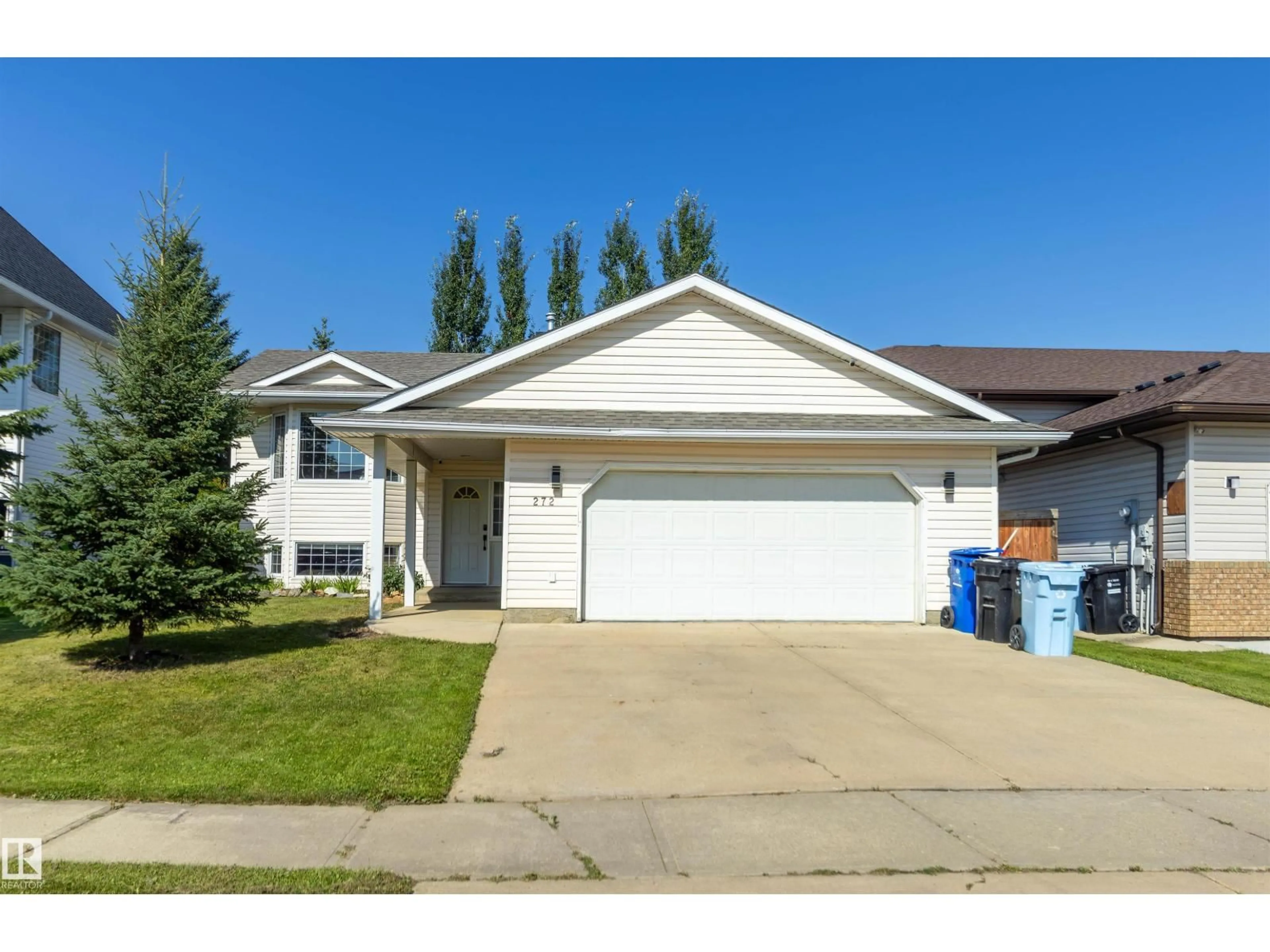 Home with vinyl exterior material, street for 272 BUSSIERES DR, Fort McMurray Alberta T9K1T3