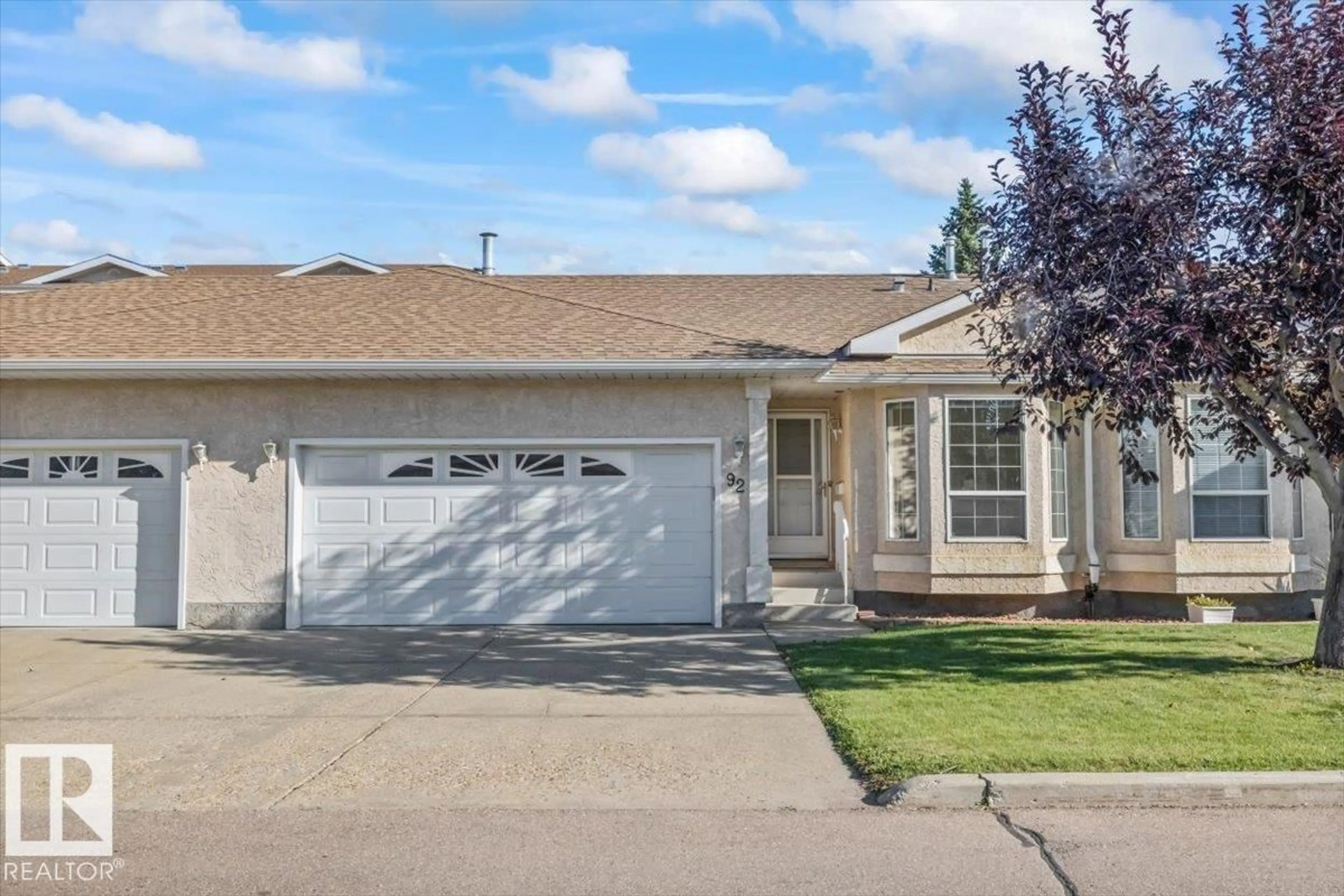 Home with vinyl exterior material, street for 13320 - 92 124 ST, Edmonton Alberta T5L5B7