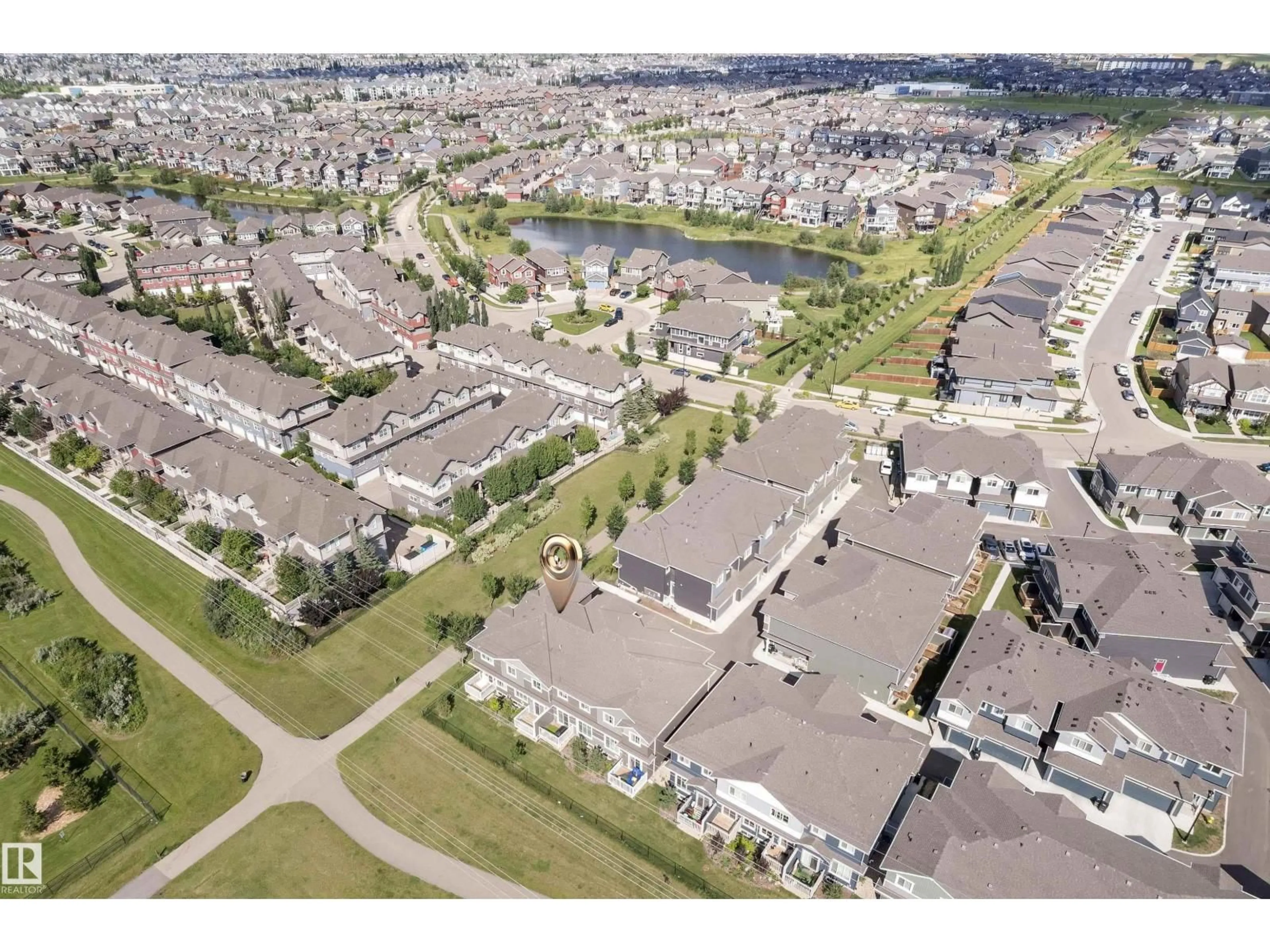 A pic from outside/outdoor area/front of a property/back of a property/a pic from drone, street for 21 - 603 ORCHARDS BV, Edmonton Alberta T6X2W8