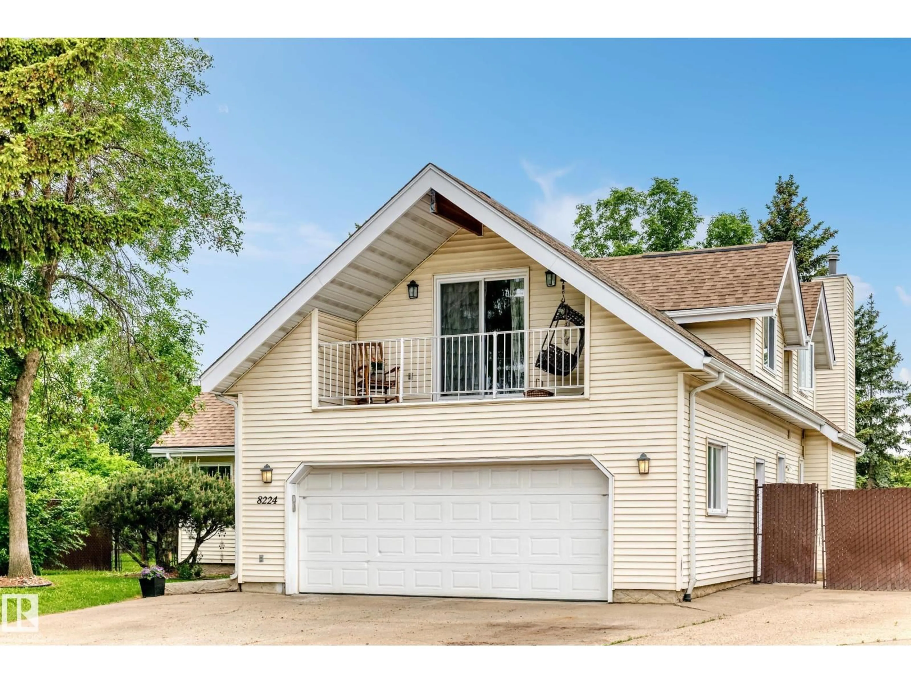 Home with vinyl exterior material, street for NW - 8224 186 ST, Edmonton Alberta T5T1H4
