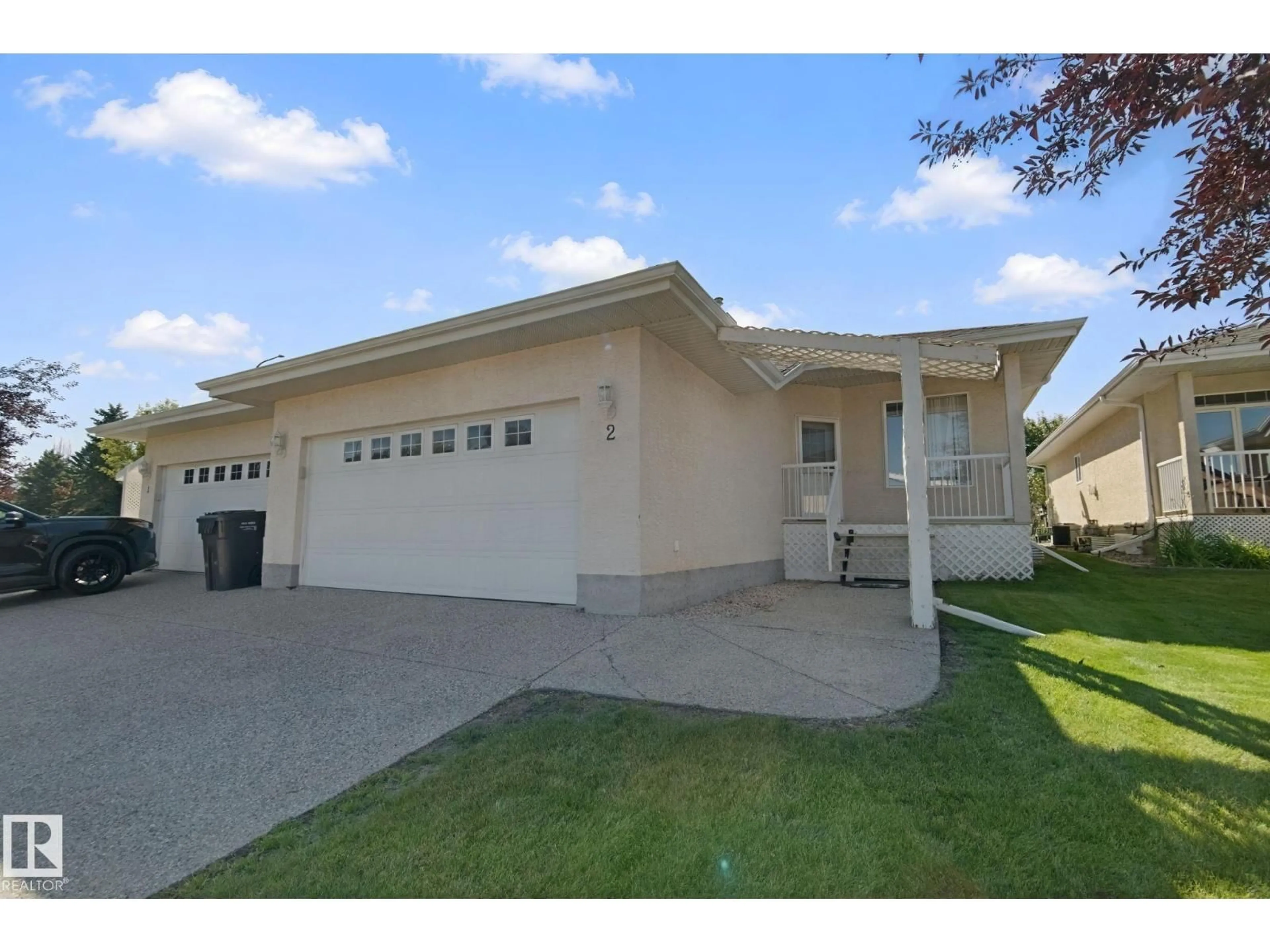 Home with vinyl exterior material, street for 9 - 2 DEER PARK DR, Spruce Grove Alberta T7X4H8