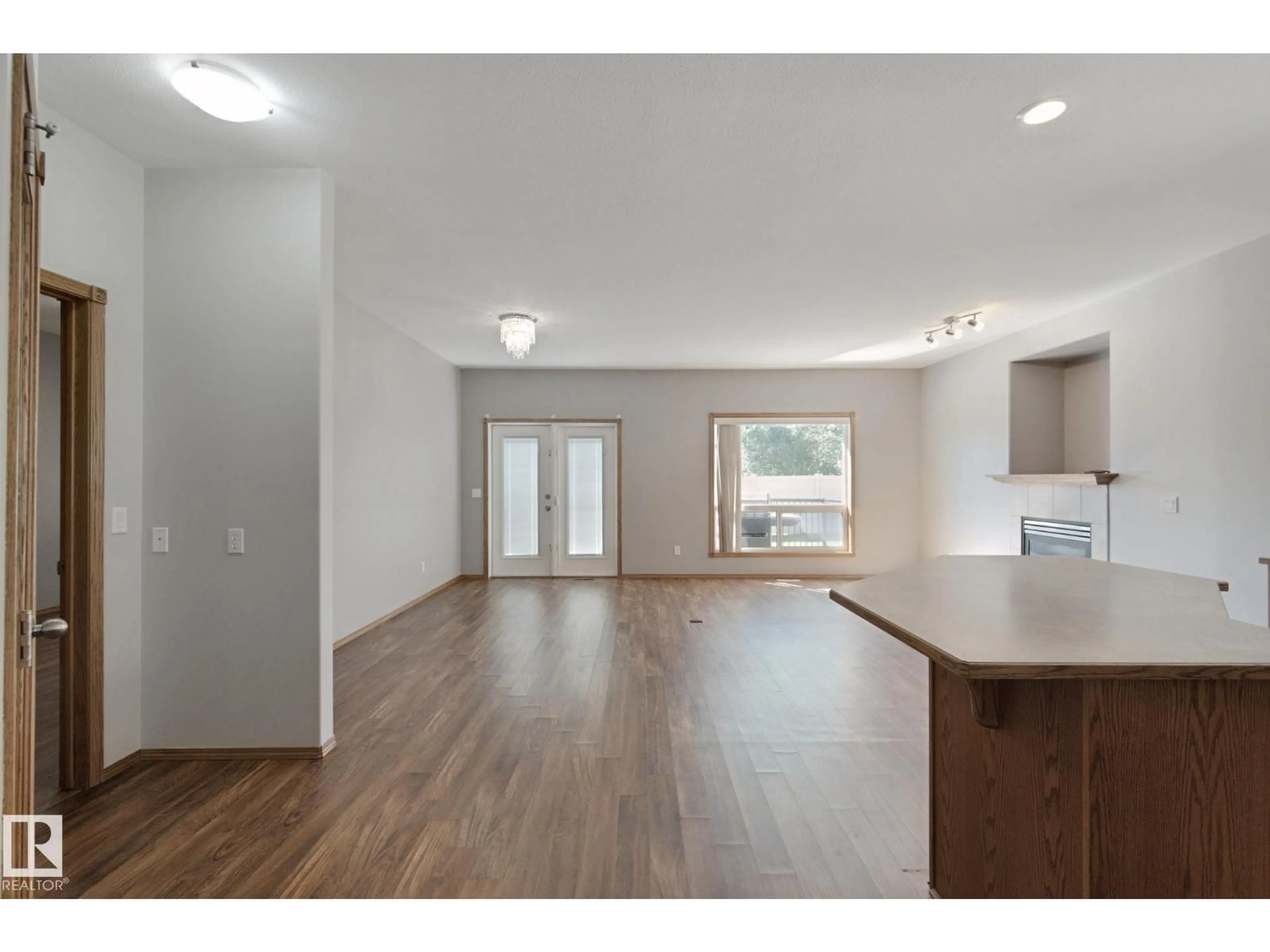 Open concept kitchen, wood/laminate floor for 9 - 2 DEER PARK DR, Spruce Grove Alberta T7X4H8