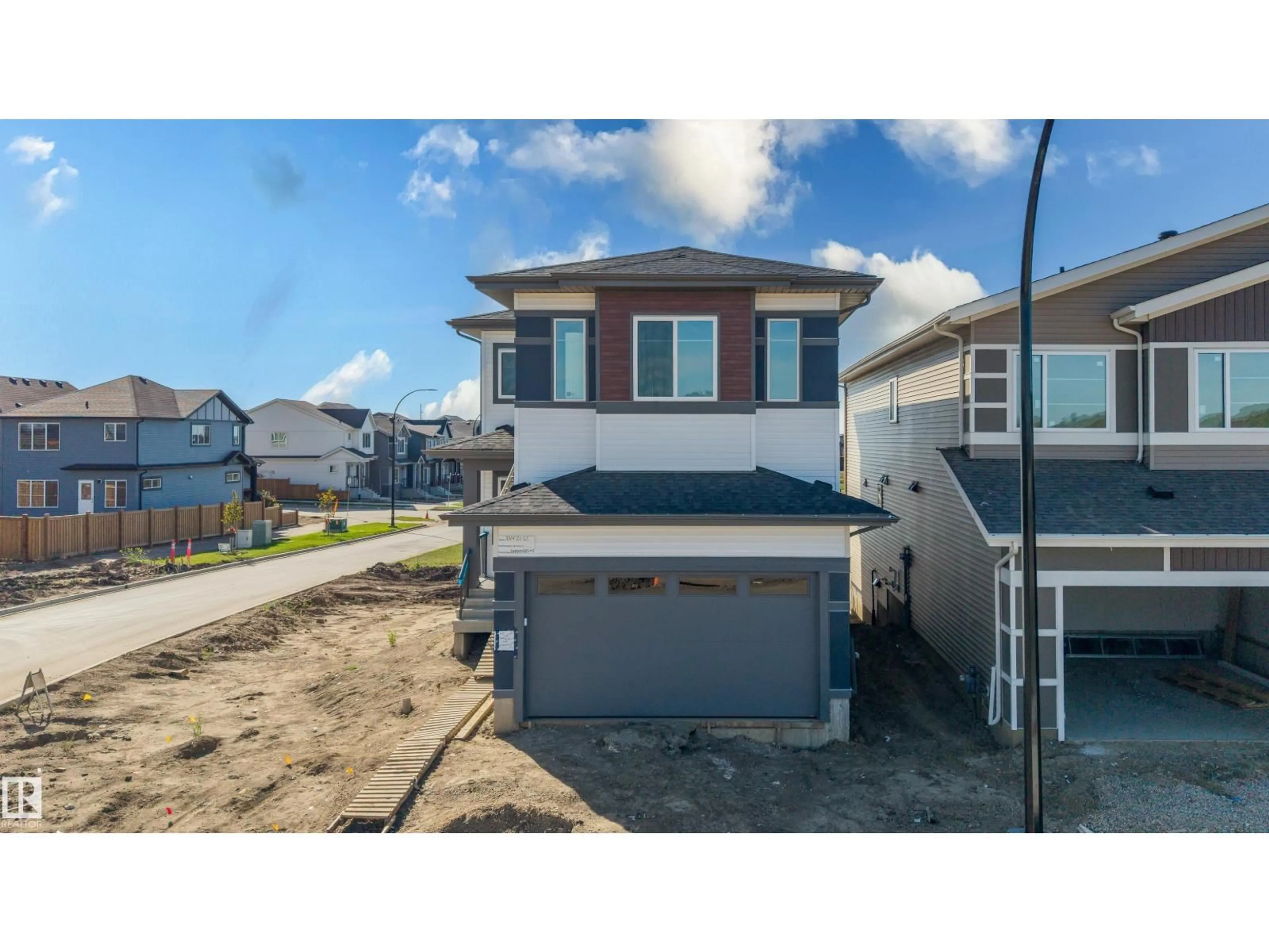 Home with vinyl exterior material, street for 244 21 ST, Edmonton Alberta T6X3C9