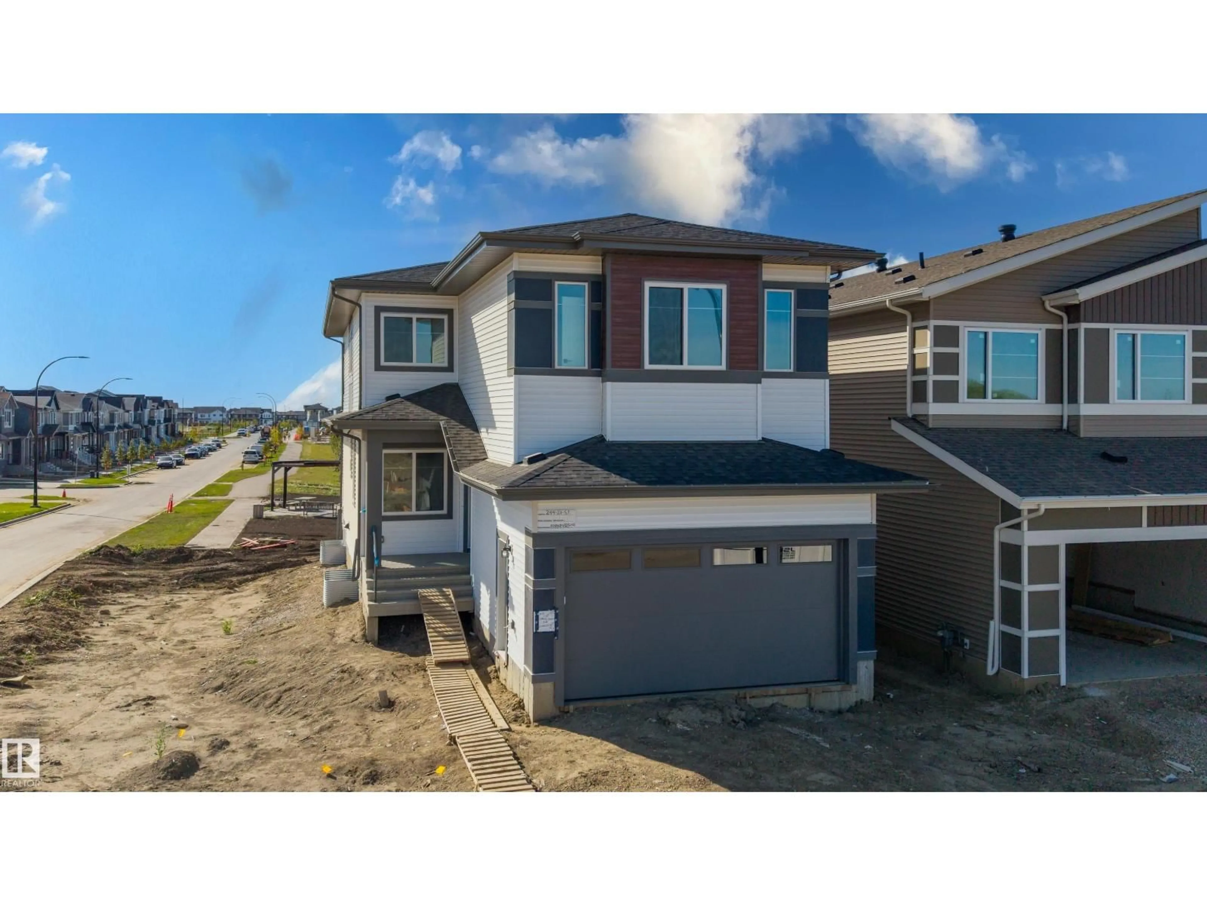 A pic from outside/outdoor area/front of a property/back of a property/a pic from drone, street for 244 21 ST, Edmonton Alberta T6X3C9
