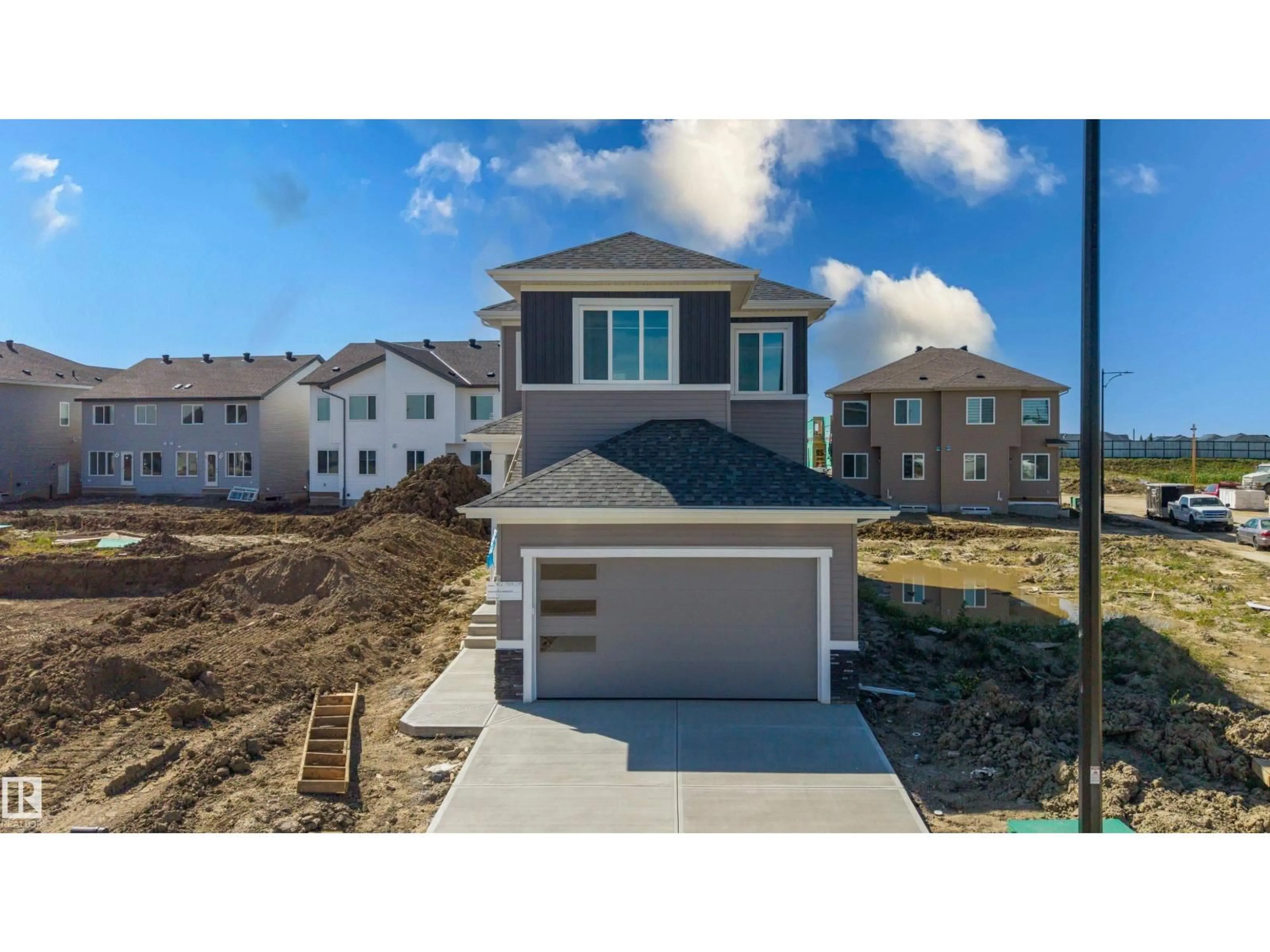A pic from outside/outdoor area/front of a property/back of a property/a pic from drone, street for 402 MUNN, Leduc Alberta T9E0J9