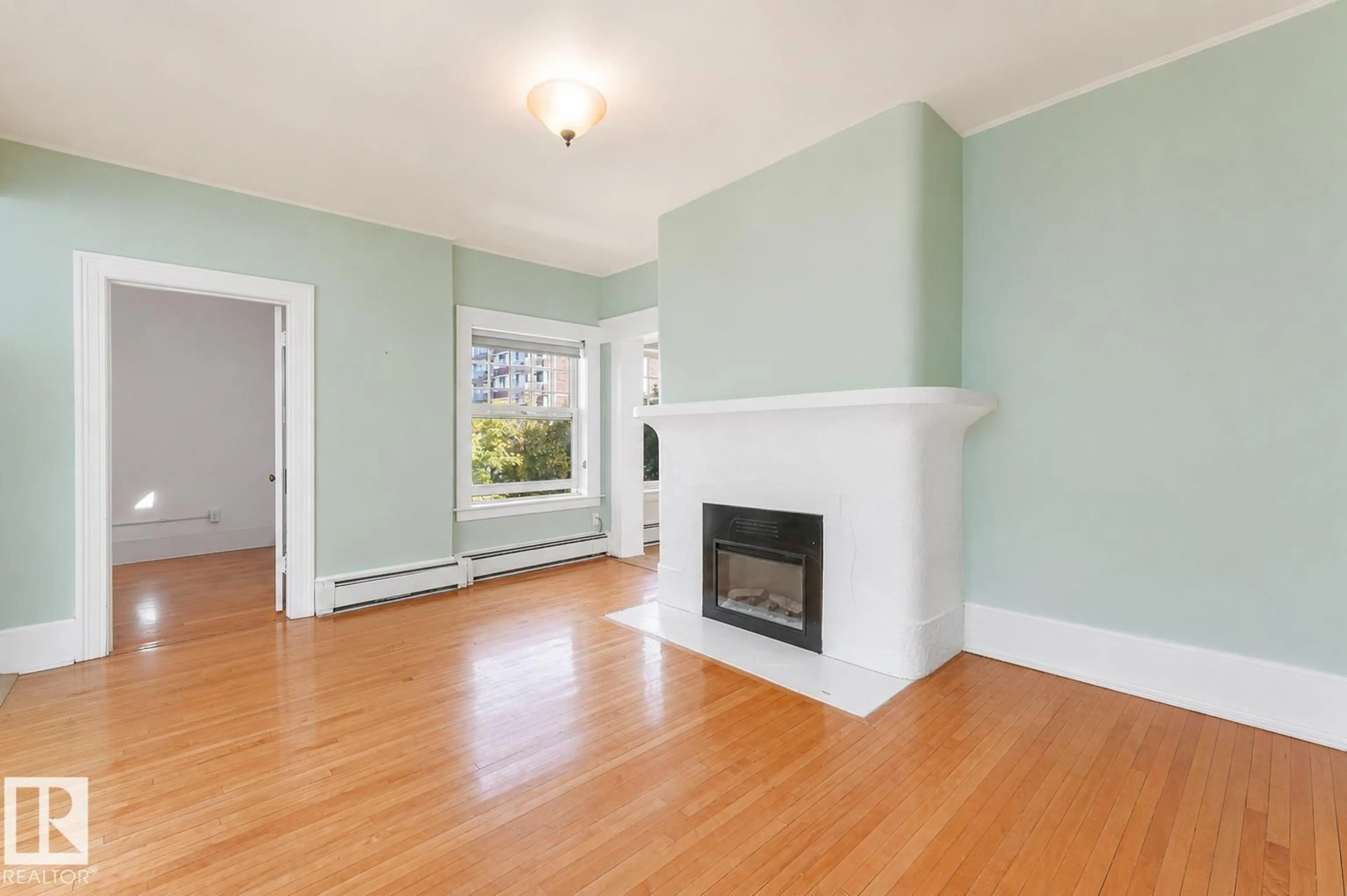 Living room with furniture, wood/laminate floor for #307 - 9955 114 ST, Edmonton Alberta T5K1P7