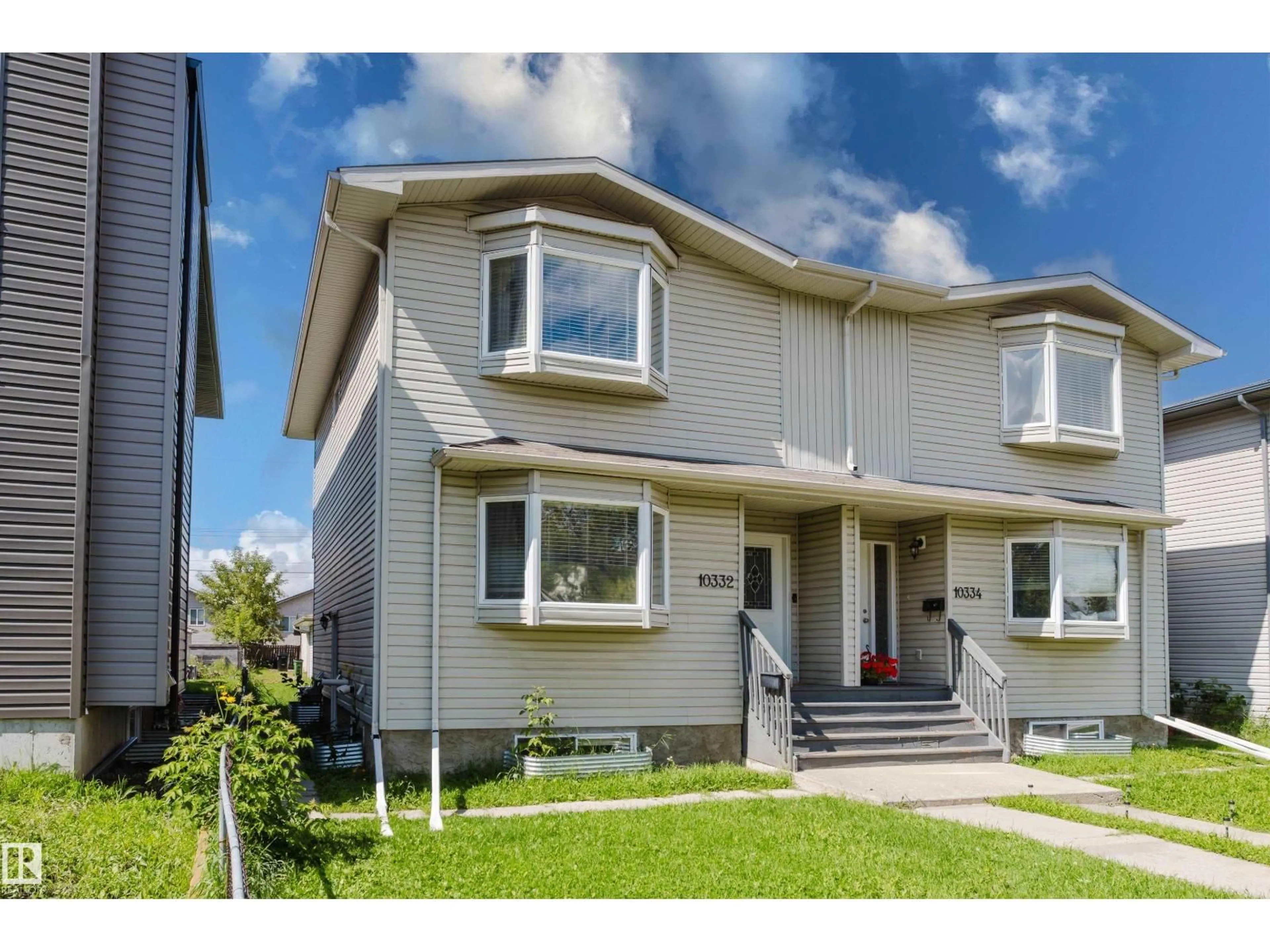Home with vinyl exterior material, street for NW - 10332 161 ST, Edmonton Alberta T5P3J3