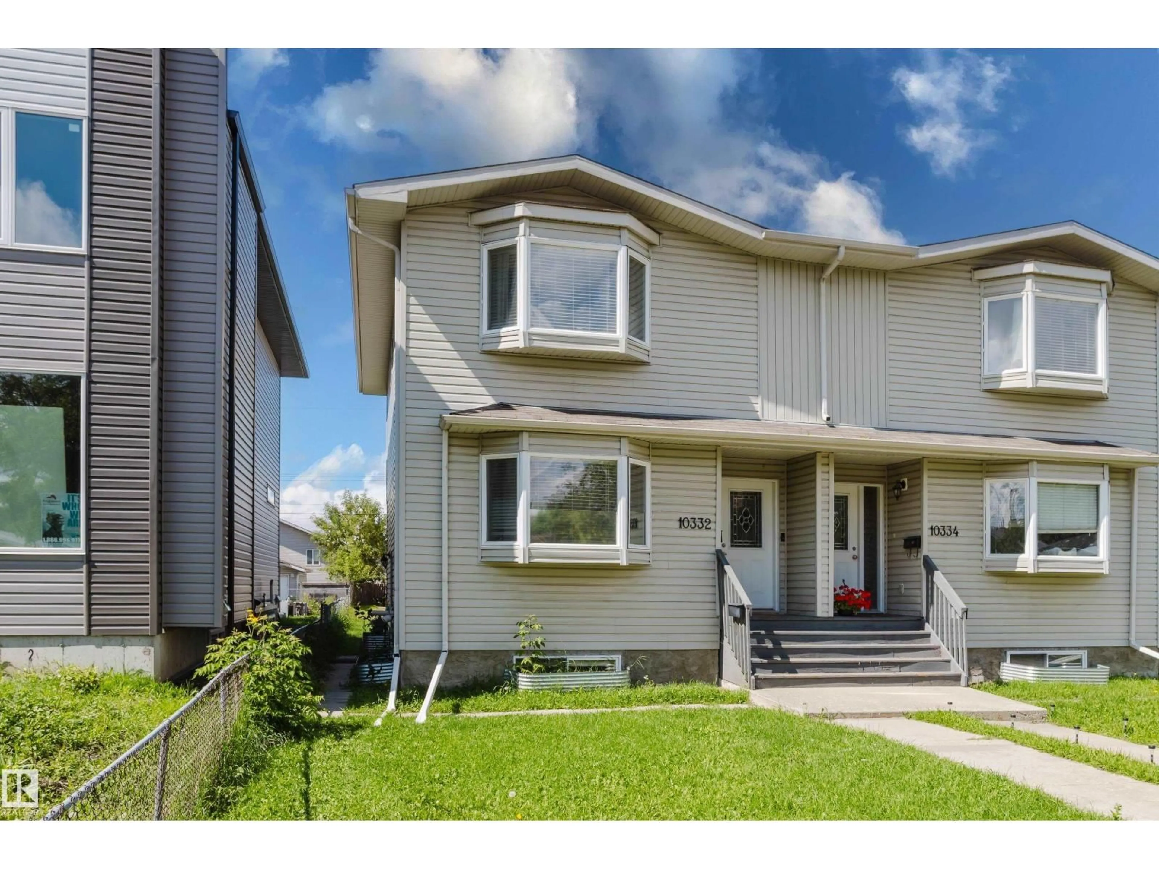 Home with vinyl exterior material, street for NW - 10332 161 ST, Edmonton Alberta T5P3J3