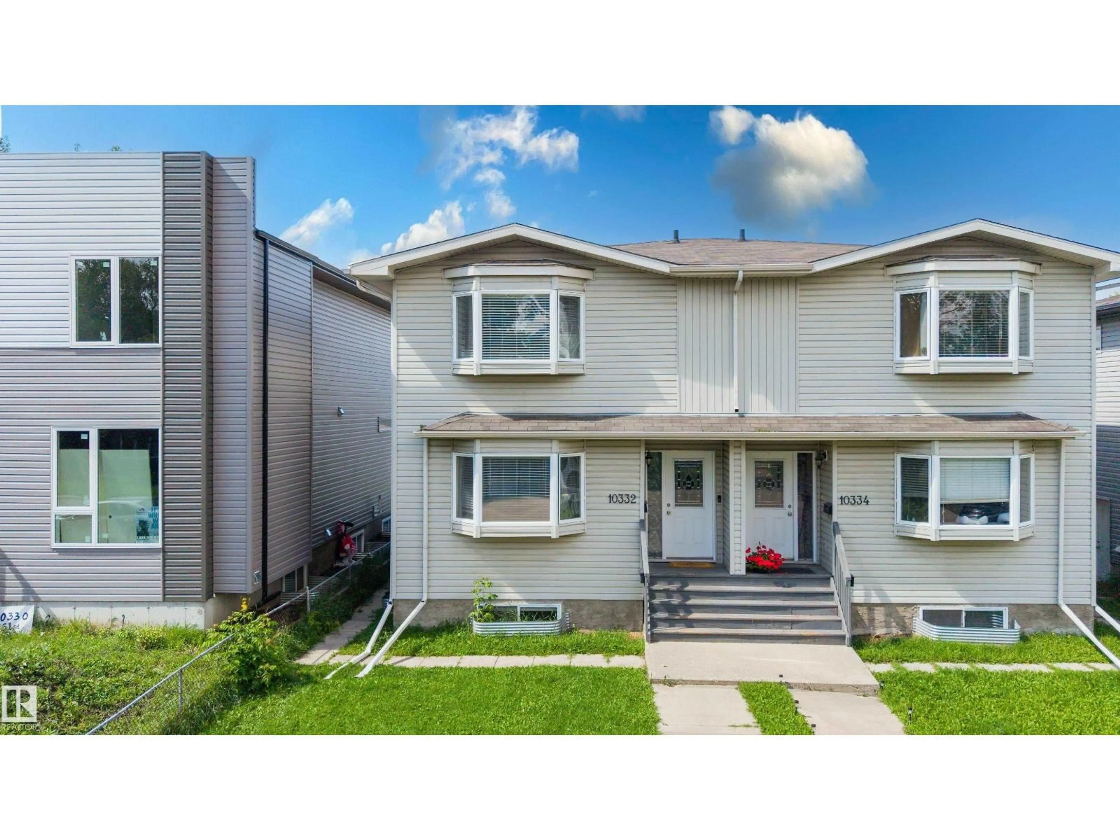 Home with vinyl exterior material, street for NW - 10332 161 ST, Edmonton Alberta T5P3J3
