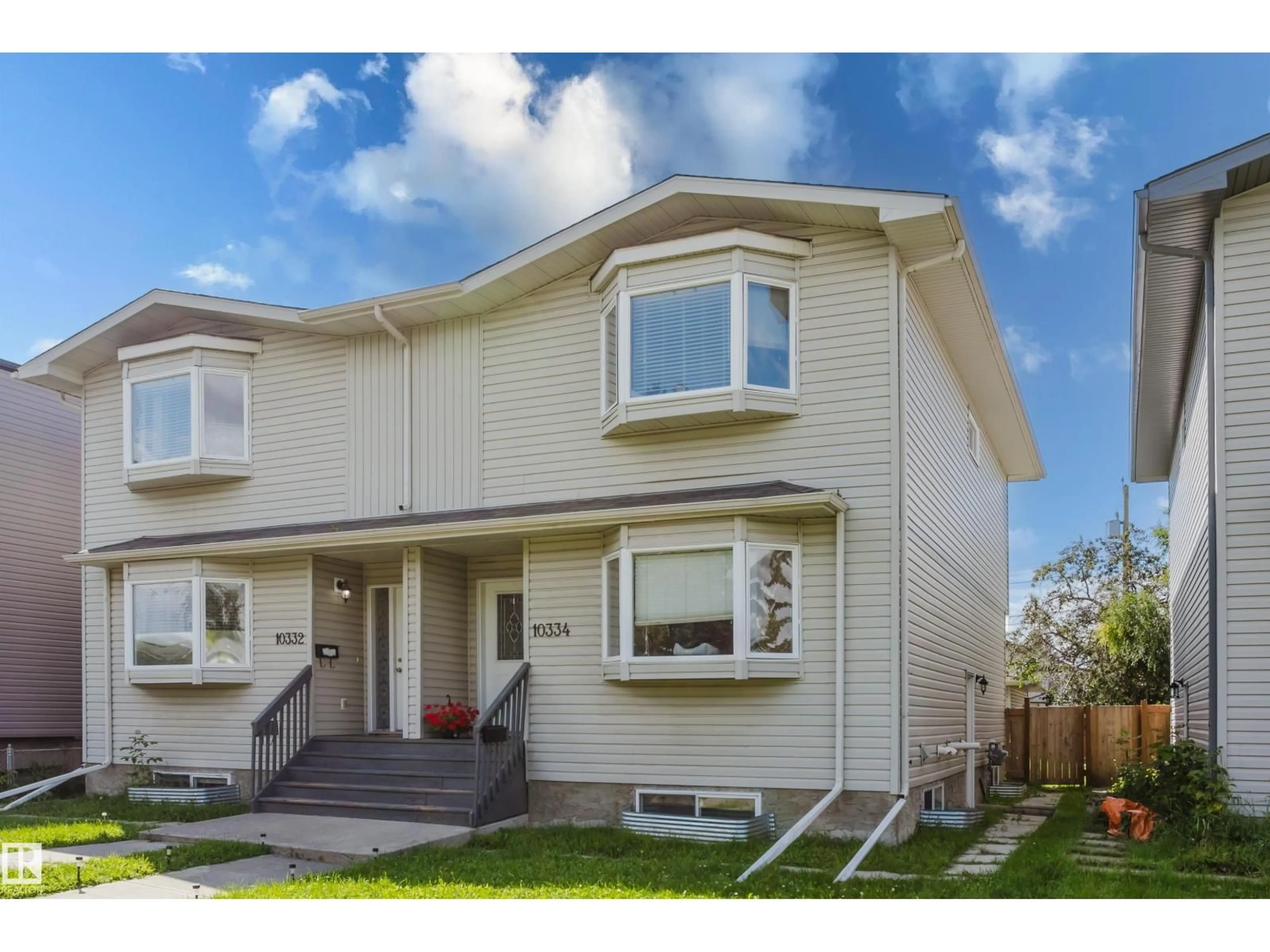 Home with vinyl exterior material, street for NW - 10334 161 ST, Edmonton Alberta T5P3J3