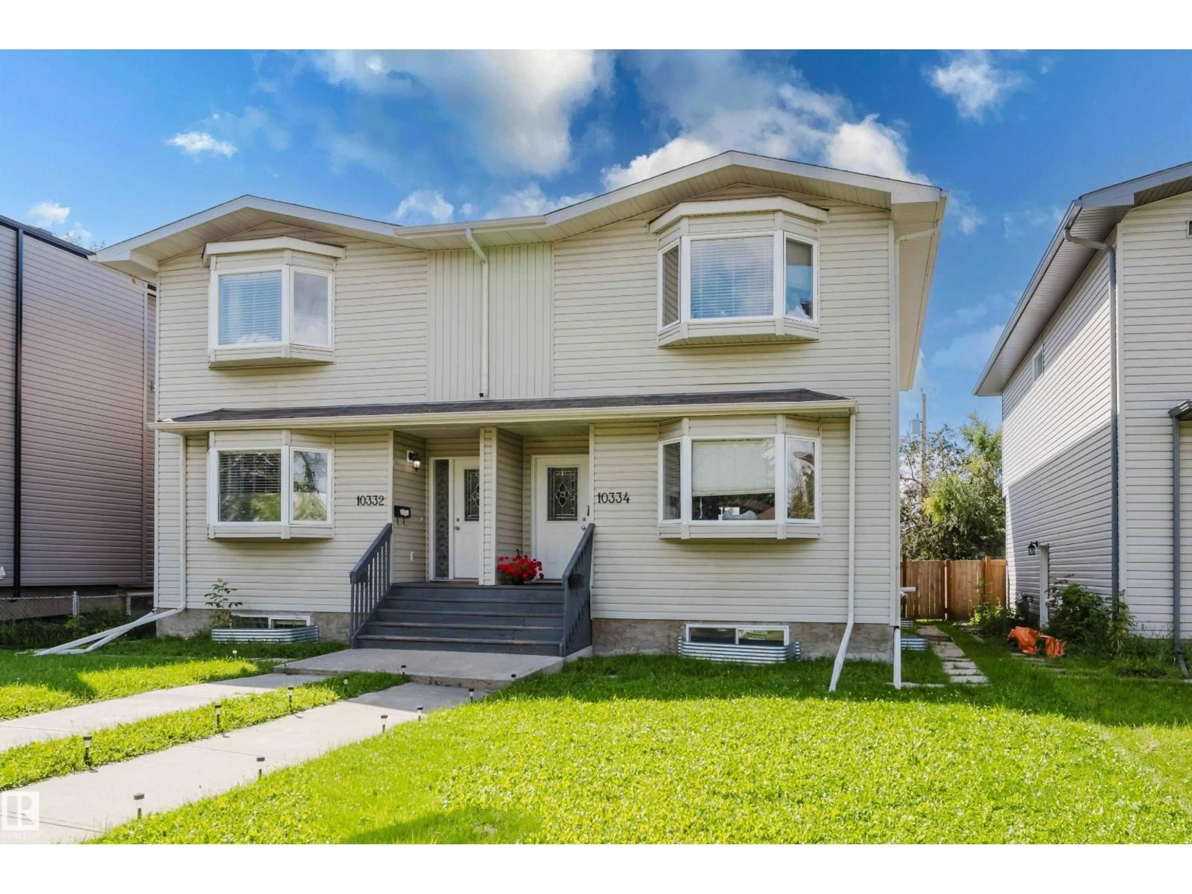 Home with vinyl exterior material, street for NW - 10334 161 ST, Edmonton Alberta T5P3J3