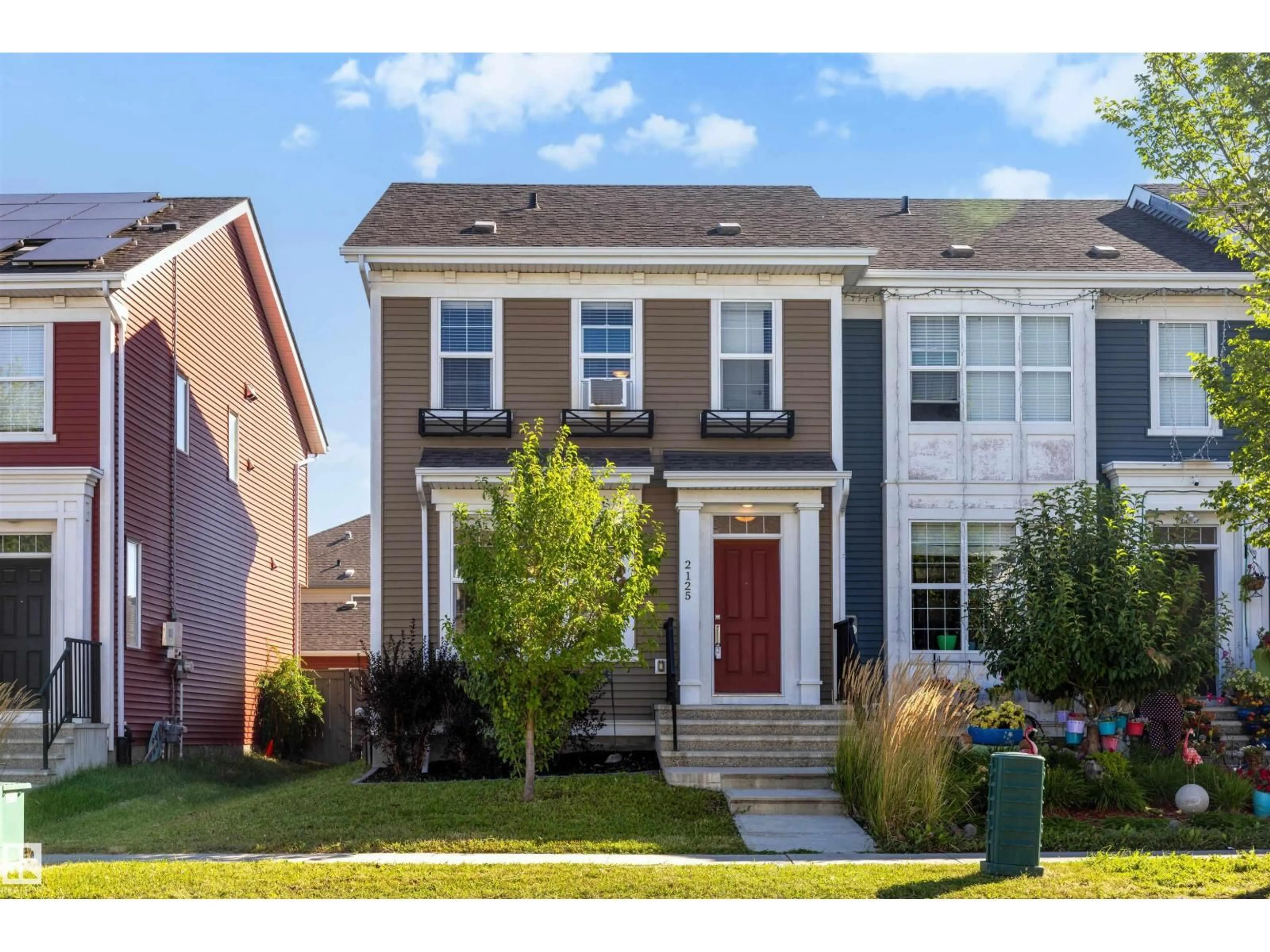 Home with vinyl exterior material, street for 2125 24 ST, Edmonton Alberta T6T0Y4