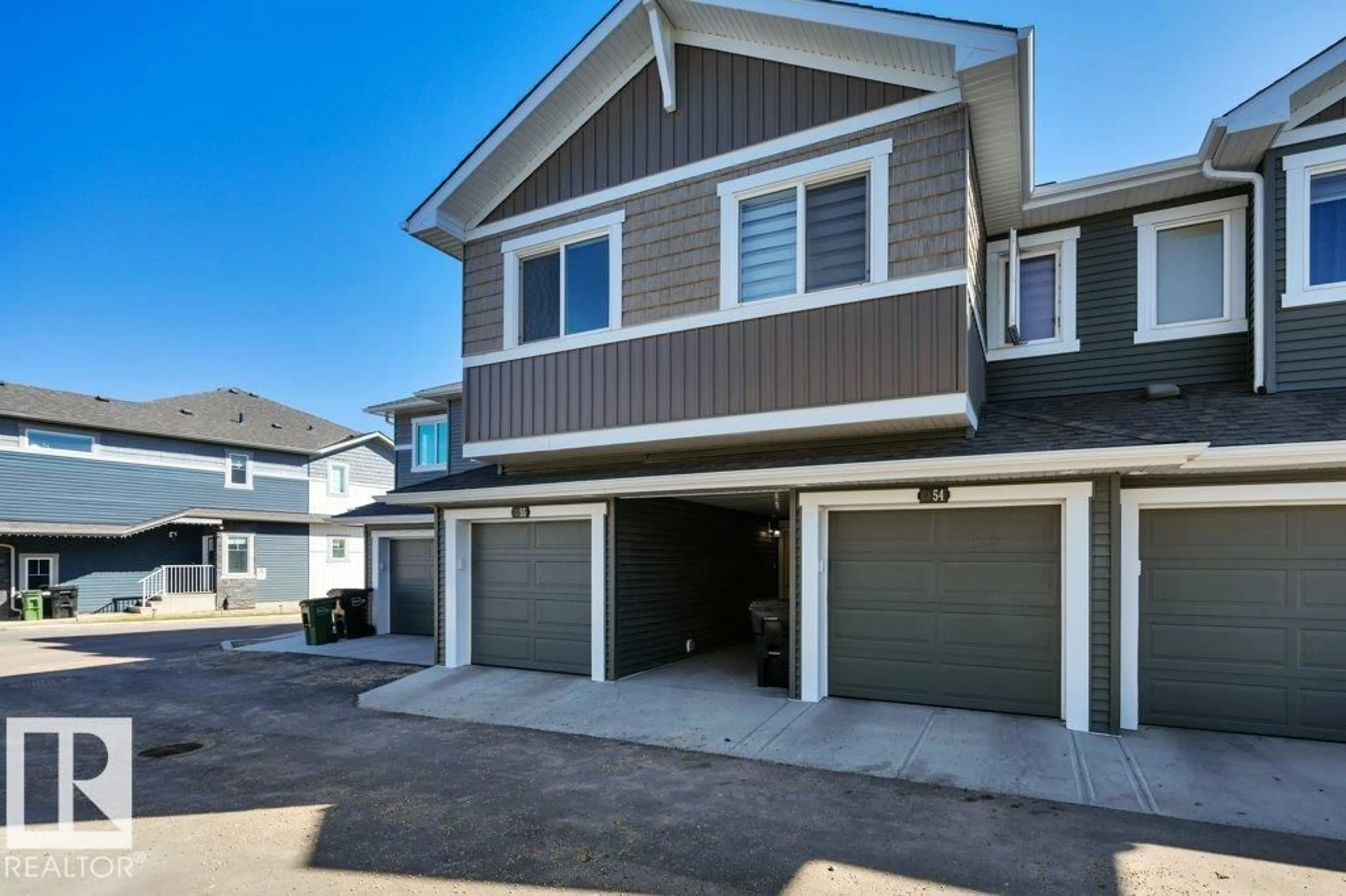 Home with vinyl exterior material, street for 603 ORCHARDS BV, Edmonton Alberta T6X2W8
