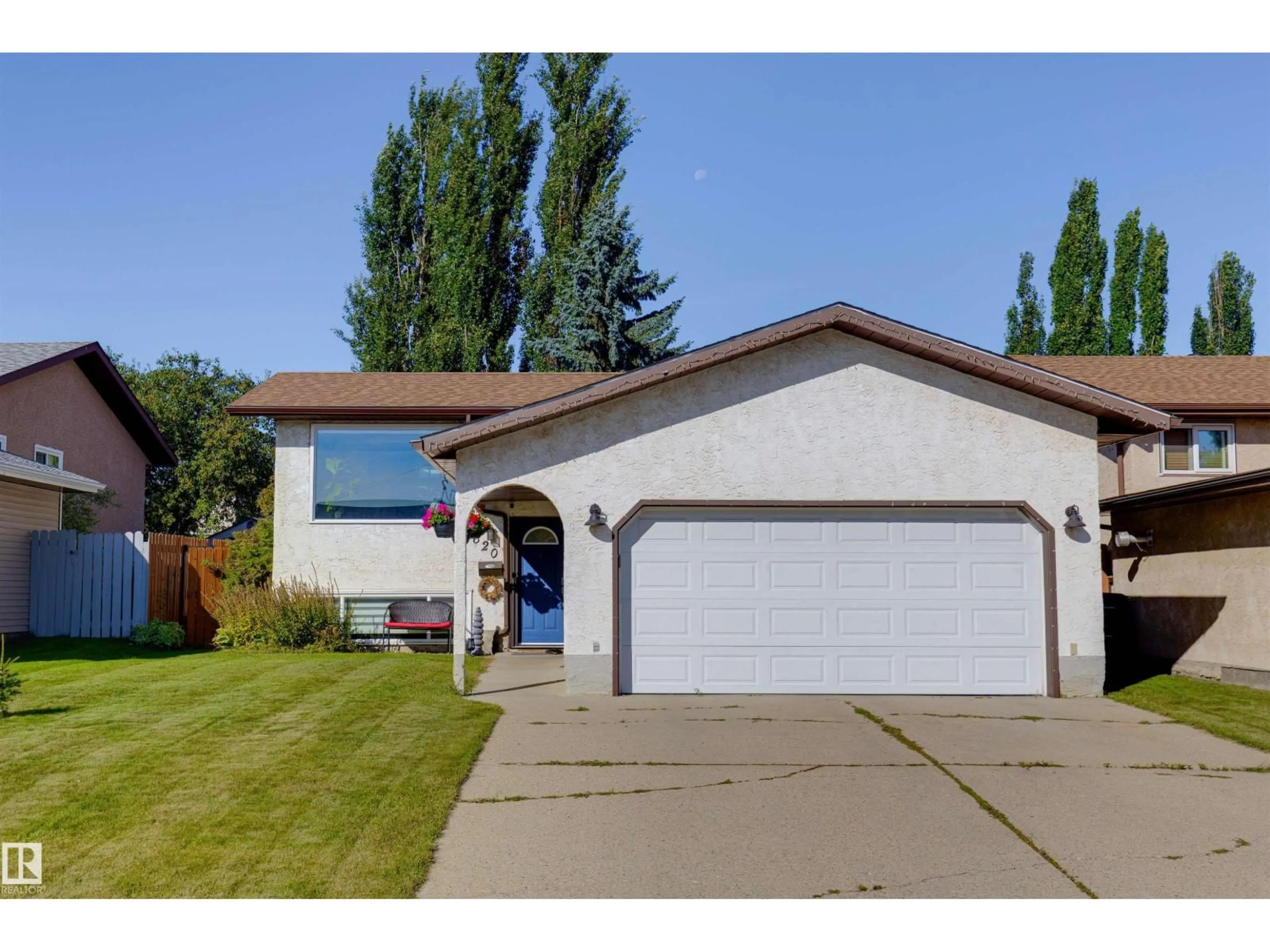 Home with vinyl exterior material, street for 2820 35 ST, Edmonton Alberta T6L3Y4
