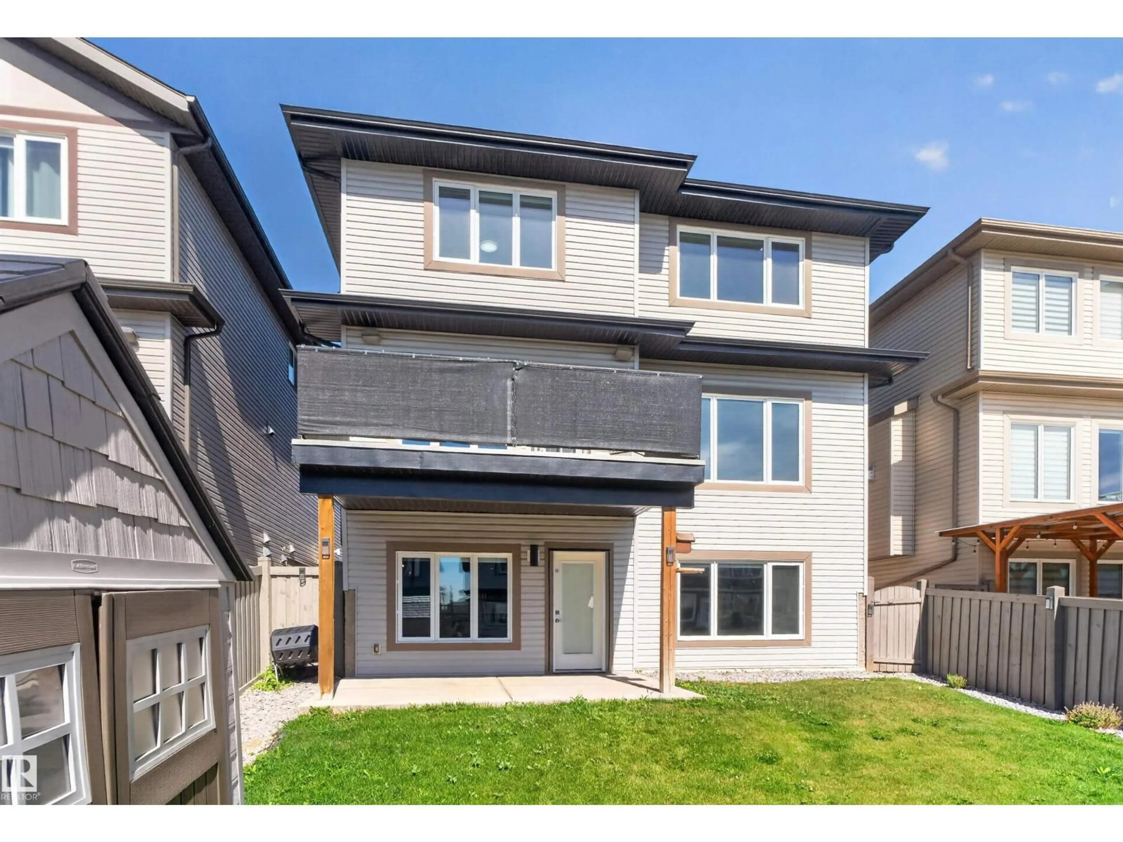 Home with vinyl exterior material, street for 4225 CHARLES CL, Edmonton Alberta T6W0Z5