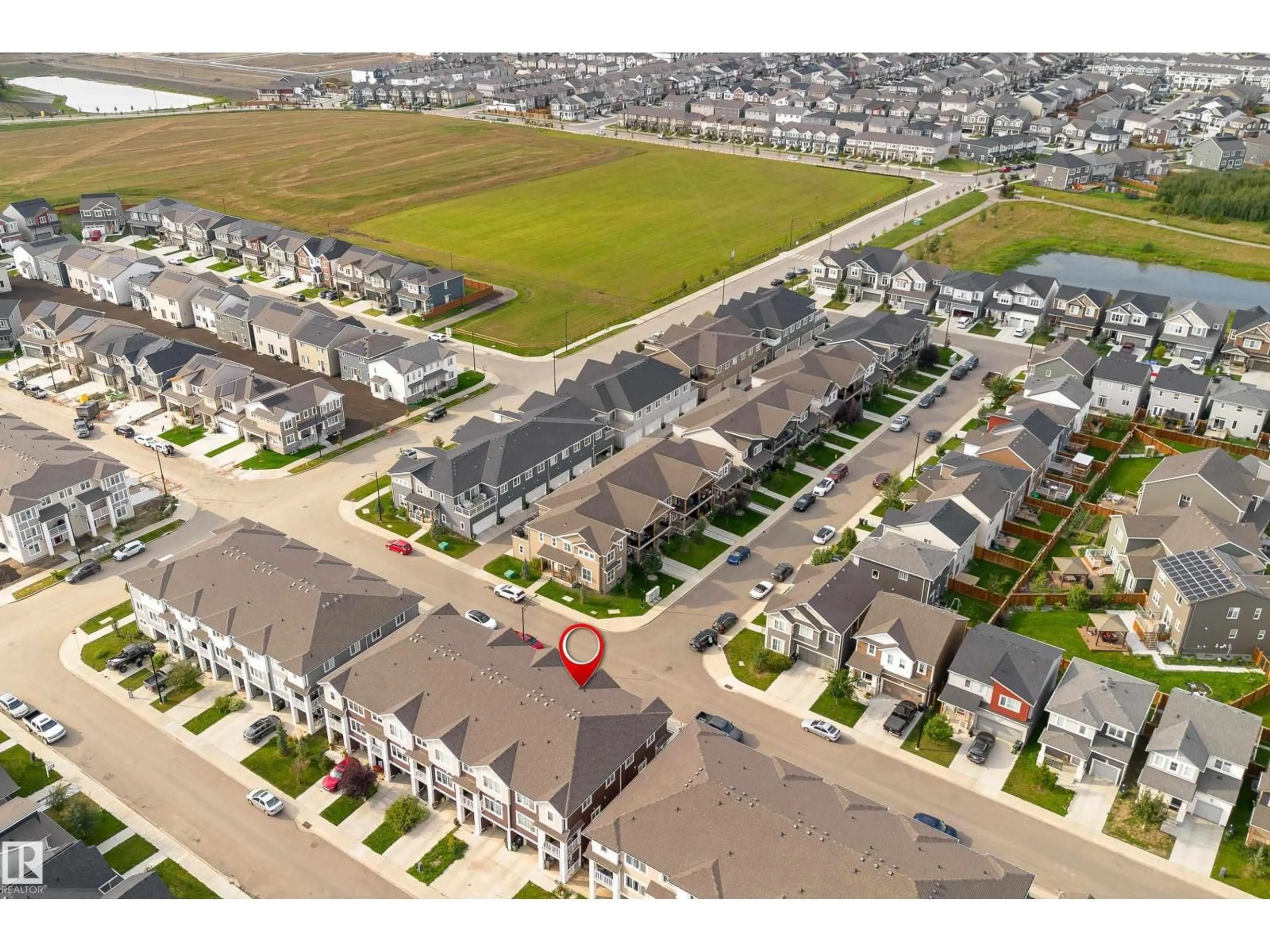 A pic from outside/outdoor area/front of a property/back of a property/a pic from drone, street for NW - 20247 16 AVENUE, Edmonton Alberta T6M1K8