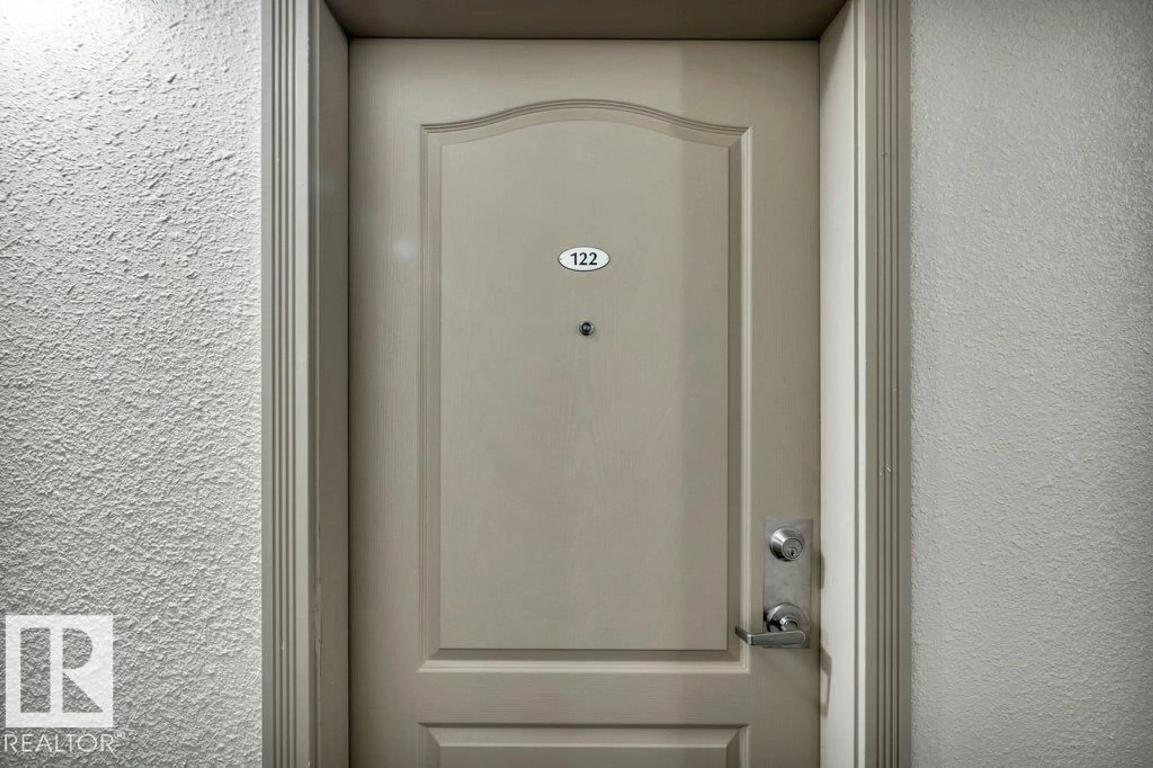 Indoor entryway for #122 - 12550 140 AV, Edmonton Alberta T5X6J4