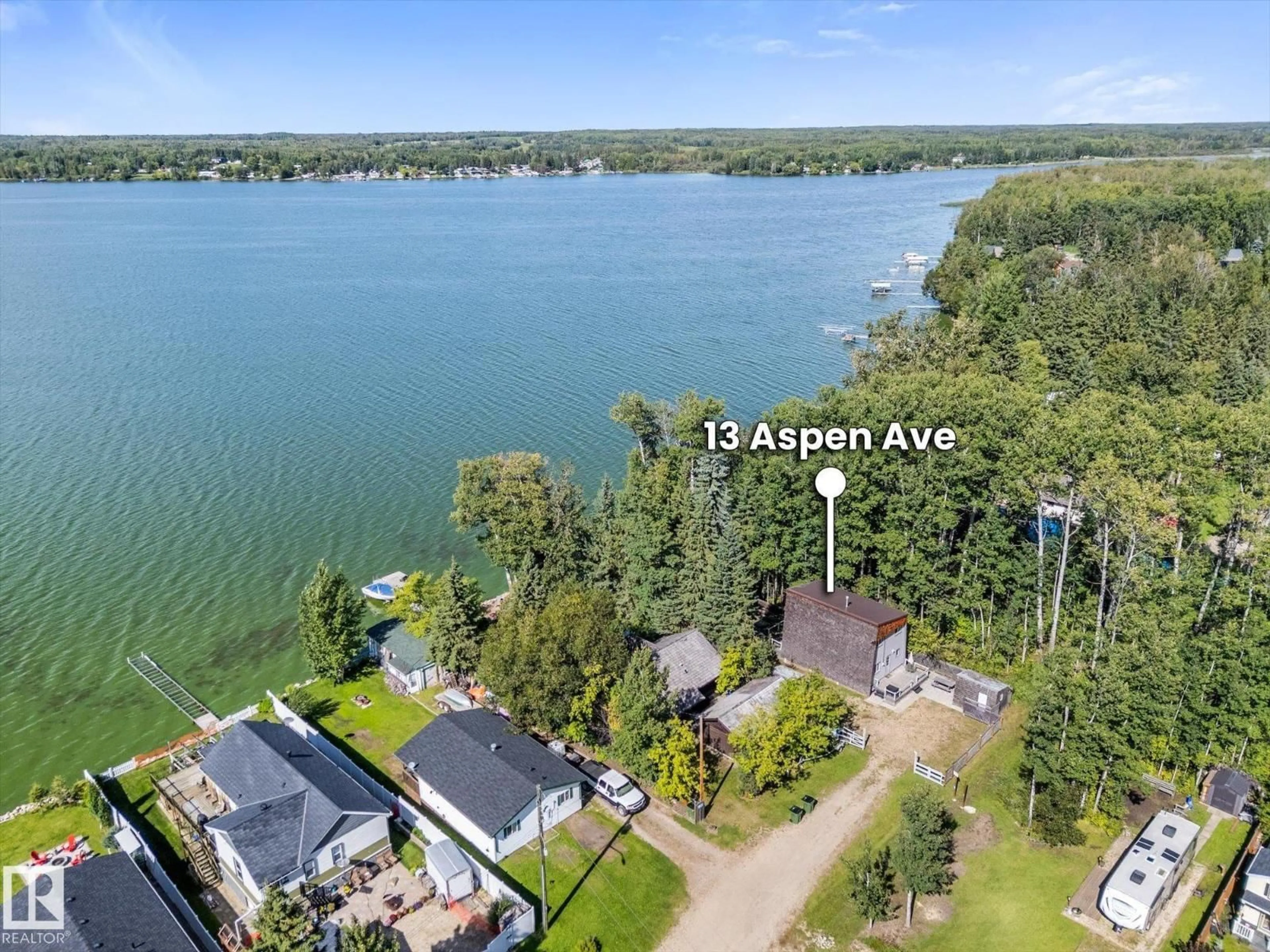A pic from outside/outdoor area/front of a property/back of a property/a pic from drone, water/lake/river/ocean view for 13 ASPEN AV, Rural Lac Ste. Anne County Alberta T0E1H0