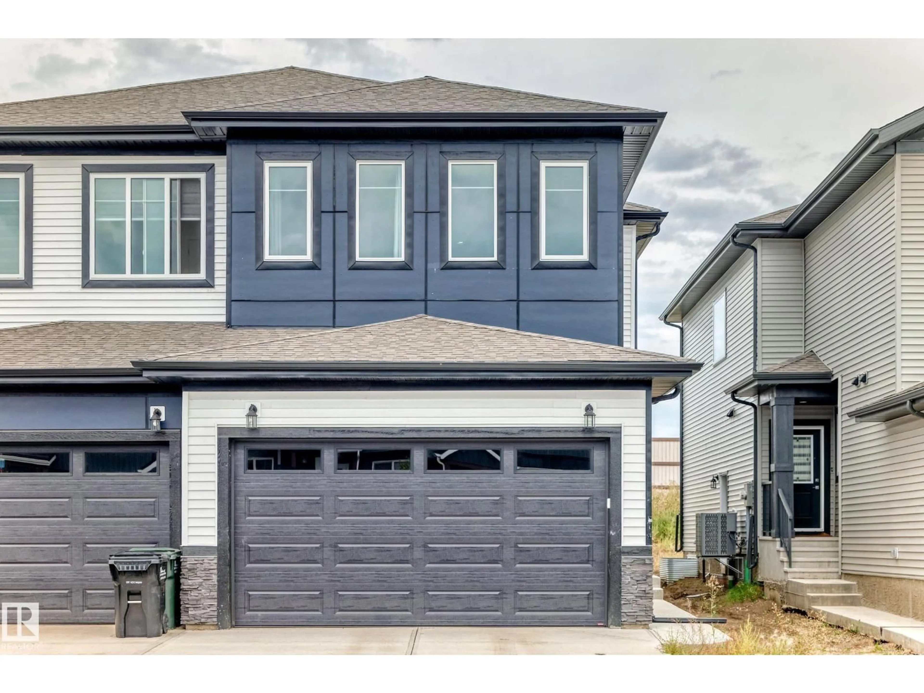 Home with vinyl exterior material, street for 215 SAVOY CR, Sherwood Park Alberta T8H3A8