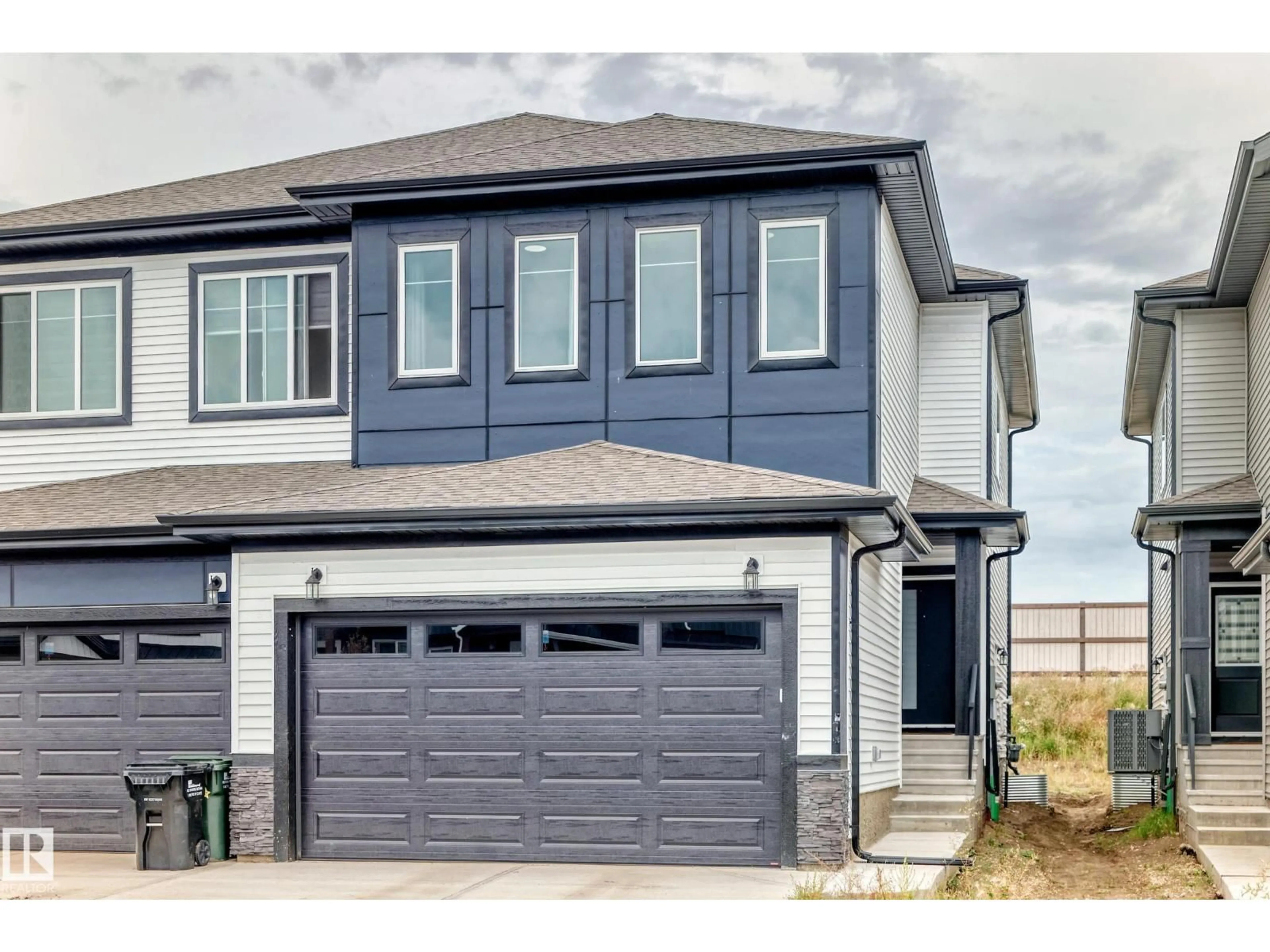Home with vinyl exterior material, street for 215 SAVOY CR, Sherwood Park Alberta T8H3A8