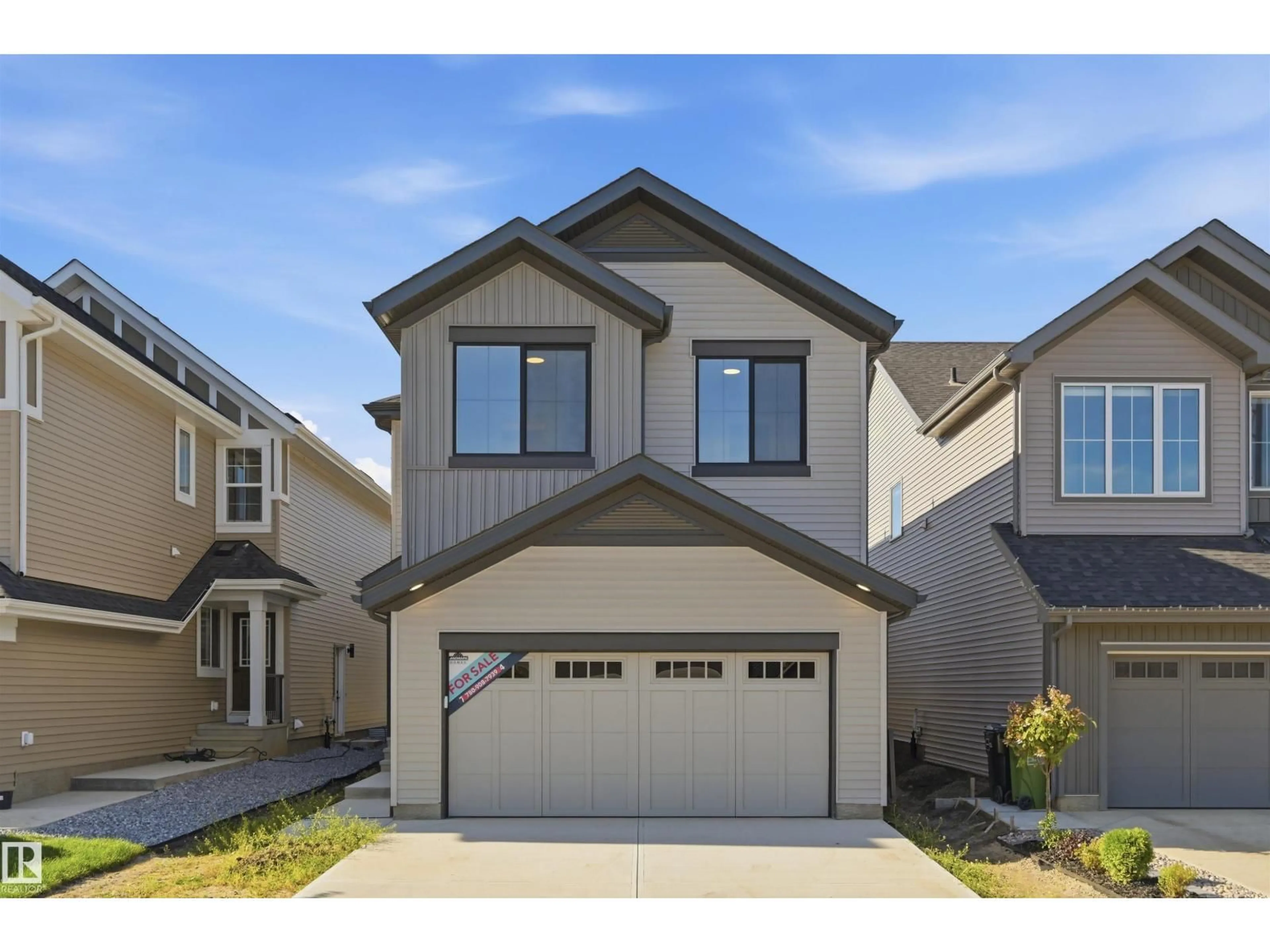 Home with vinyl exterior material, street for 3038 DIXON LD, Edmonton Alberta T6W5L2