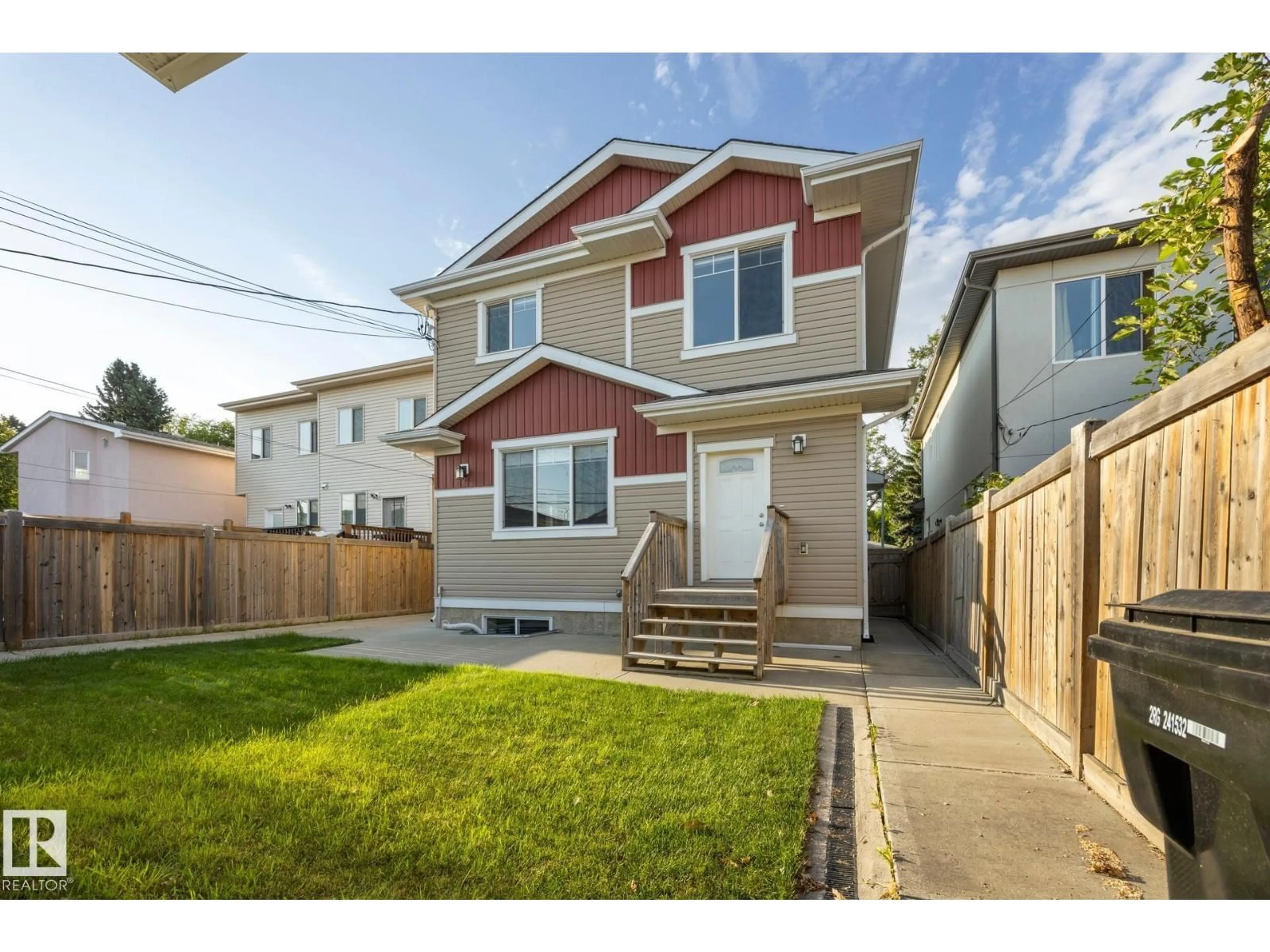 Home with vinyl exterior material, street for 8952 81 AV, Edmonton Alberta T6C0W8