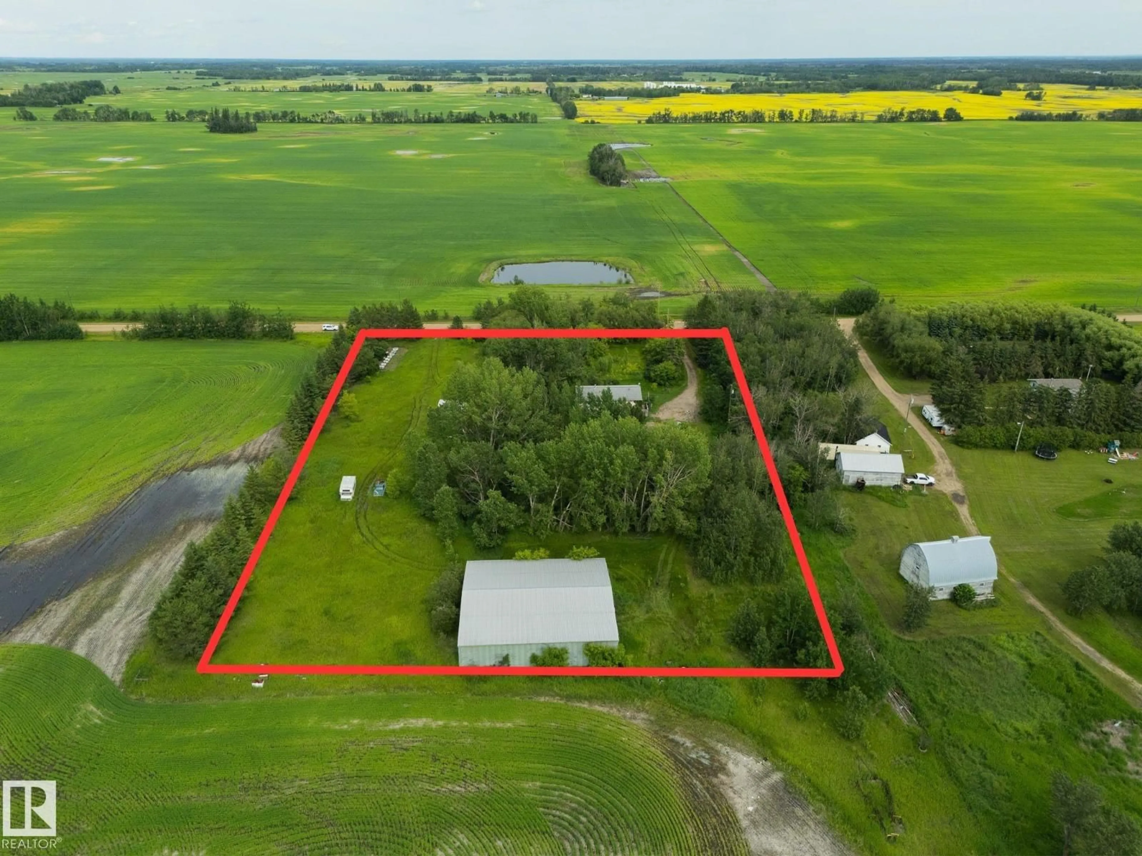 A pic from outside/outdoor area/front of a property/back of a property/a pic from drone, building for 57518 RGE ROAD 213, Rural Sturgeon County Alberta T0A1N6