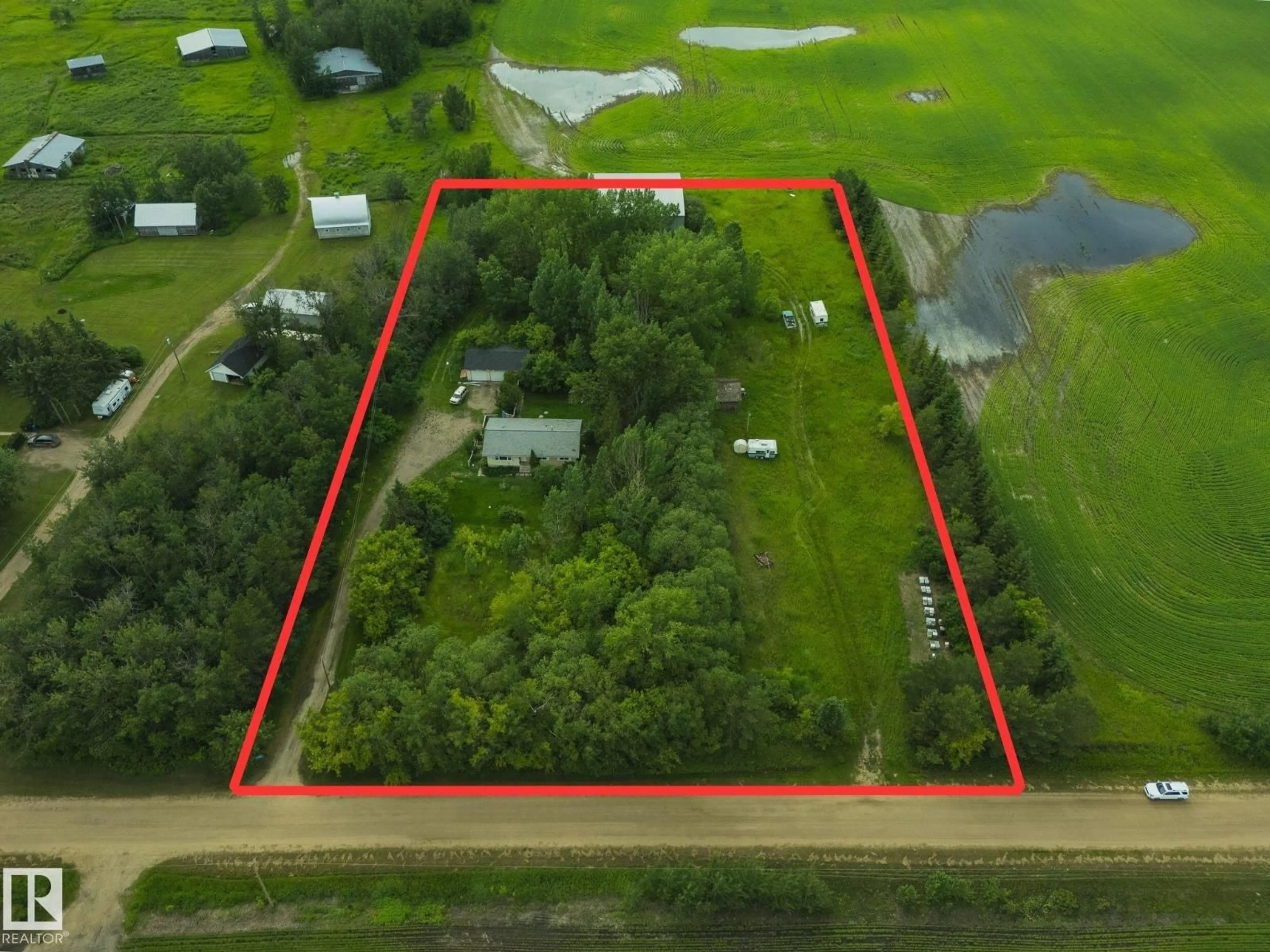 A pic from outside/outdoor area/front of a property/back of a property/a pic from drone, unknown for 57518 RGE ROAD 213, Rural Sturgeon County Alberta T0A1N6