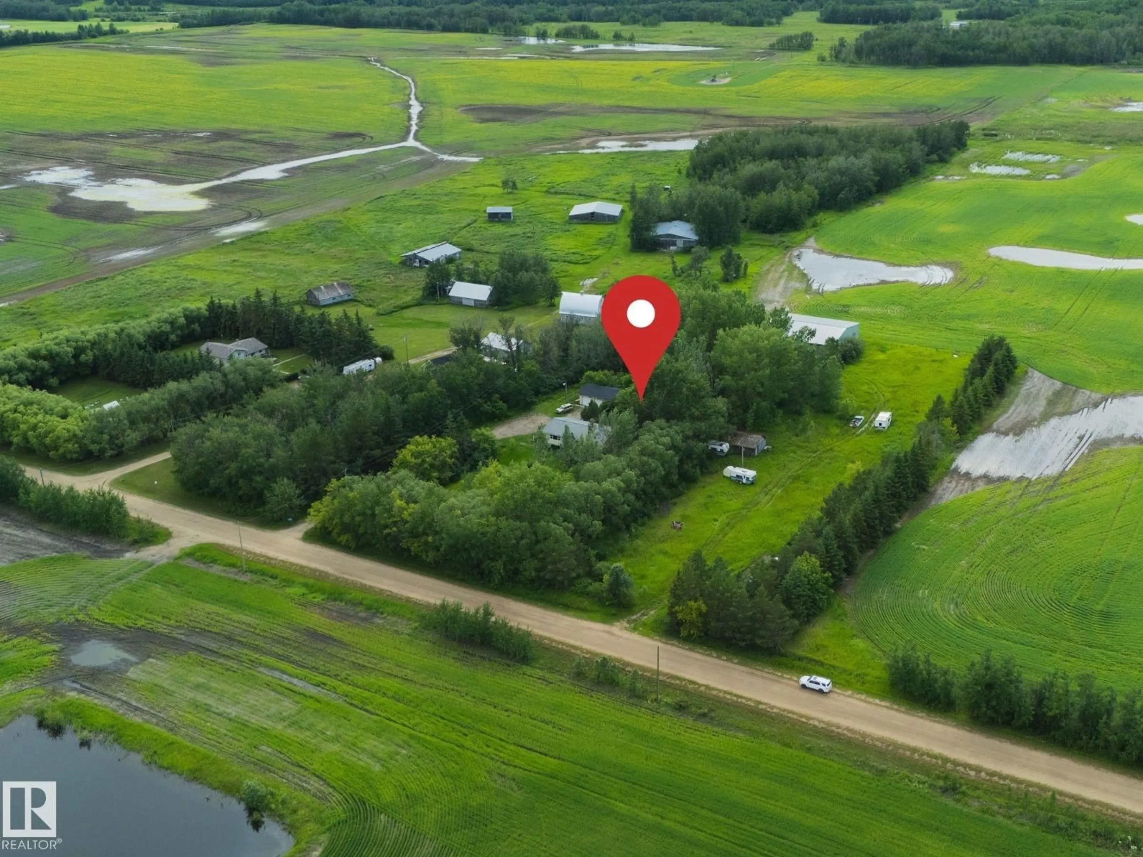 A pic from outside/outdoor area/front of a property/back of a property/a pic from drone, water/lake/river/ocean view for 57518 RGE ROAD 213, Rural Sturgeon County Alberta T0A1N6