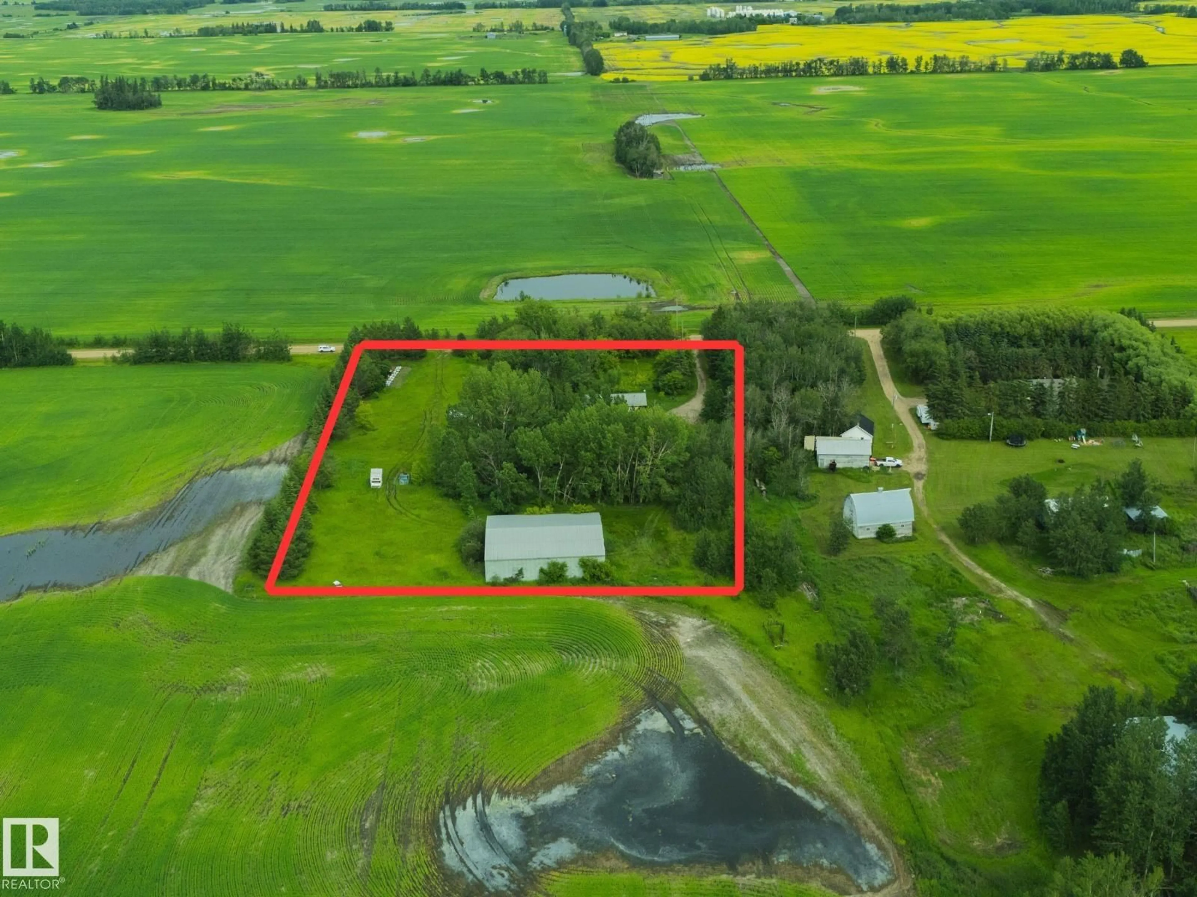 A pic from outside/outdoor area/front of a property/back of a property/a pic from drone, unknown for 57518 RGE ROAD 213, Rural Sturgeon County Alberta T0A1N6