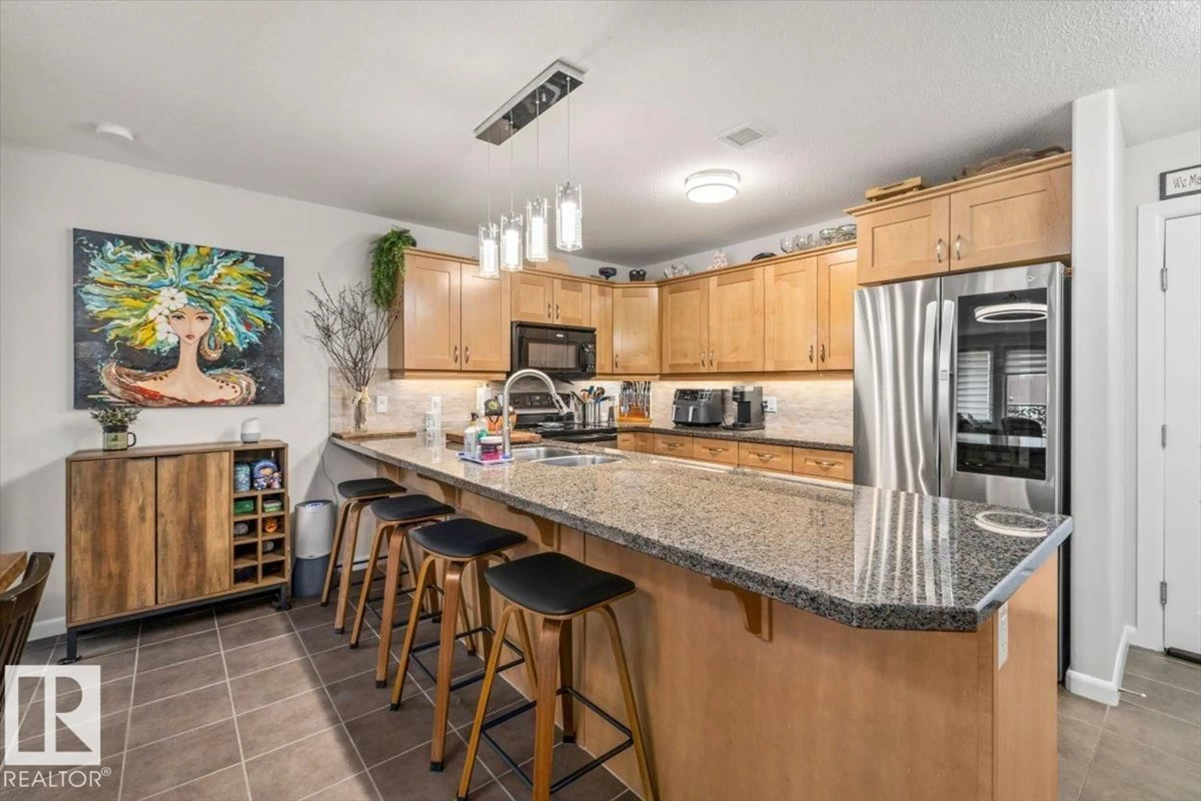 Open concept kitchen, ceramic/tile floor for 309 - 400 PALISADES WY, Sherwood Park Alberta T8H0H4