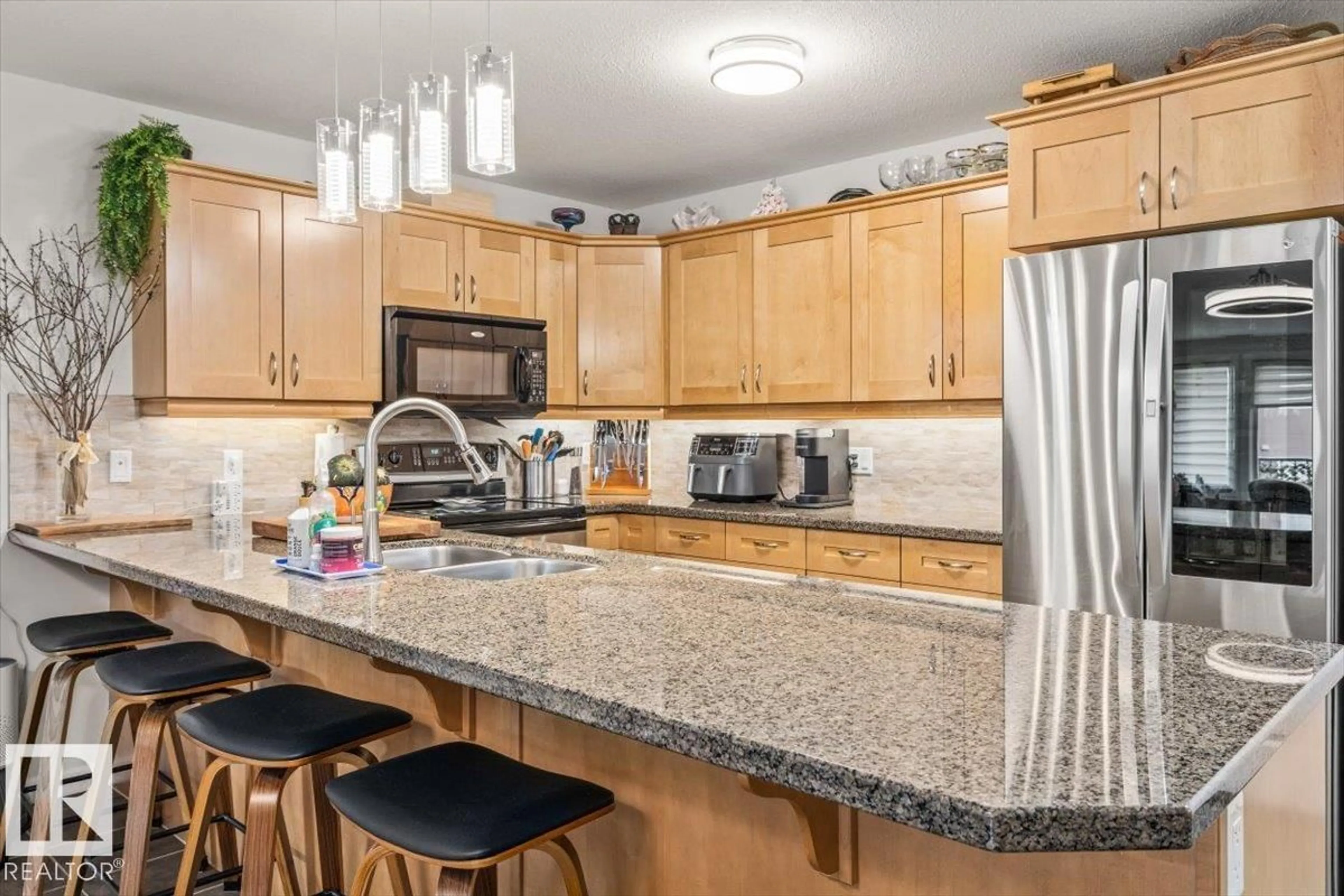 Open concept kitchen, ceramic/tile floor for 309 - 400 PALISADES WY, Sherwood Park Alberta T8H0H4