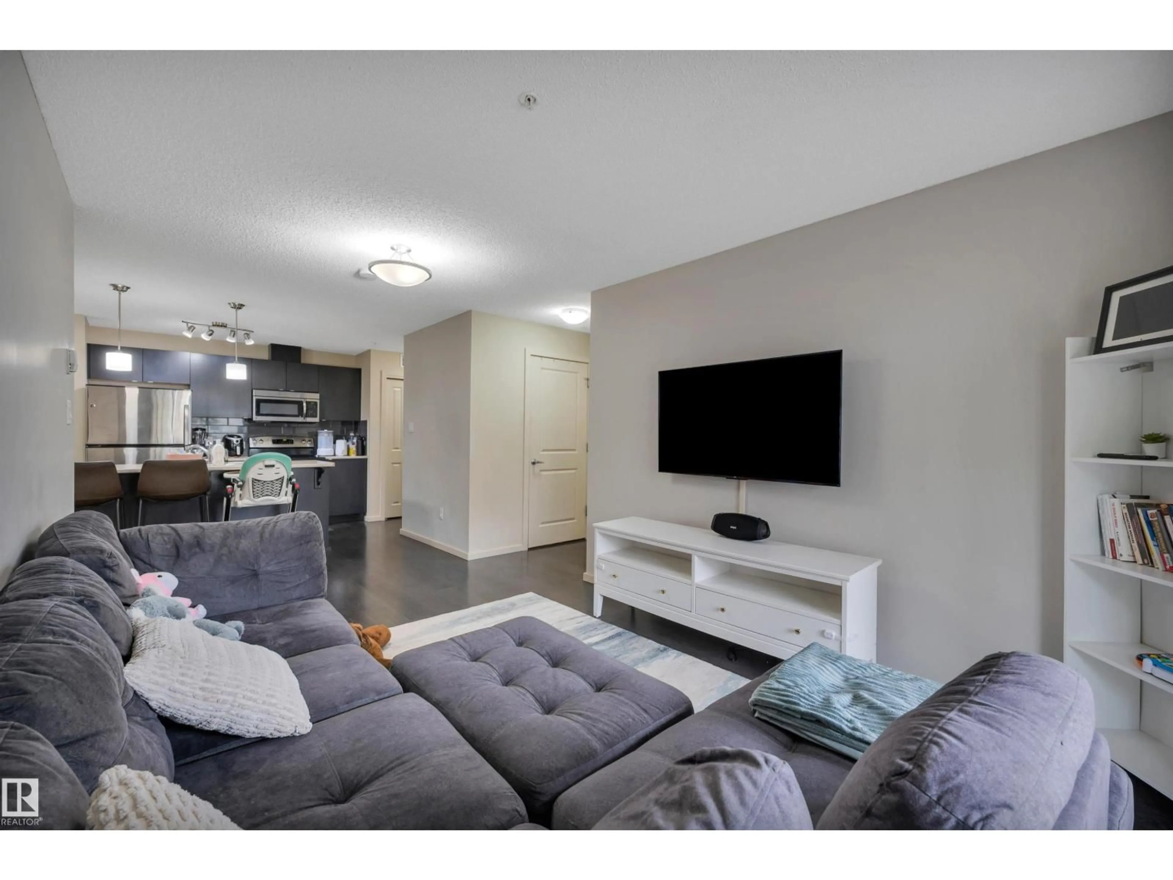 Living room with furniture, unknown for #216 - 340 WINDERMERE RD, Edmonton Alberta T6W0R1