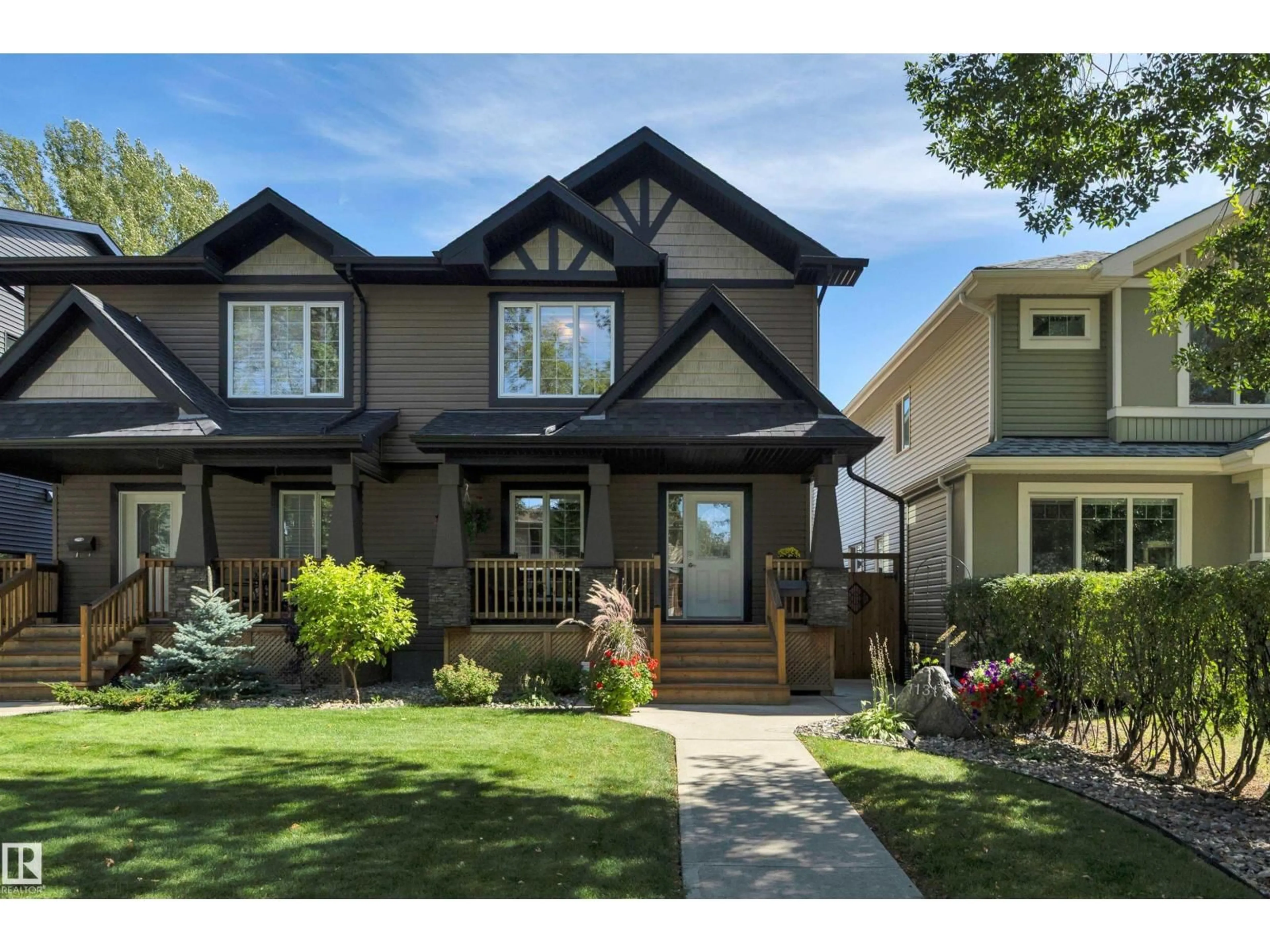 Home with vinyl exterior material, street for NW - 11317 123 ST, Edmonton Alberta T5M0G1