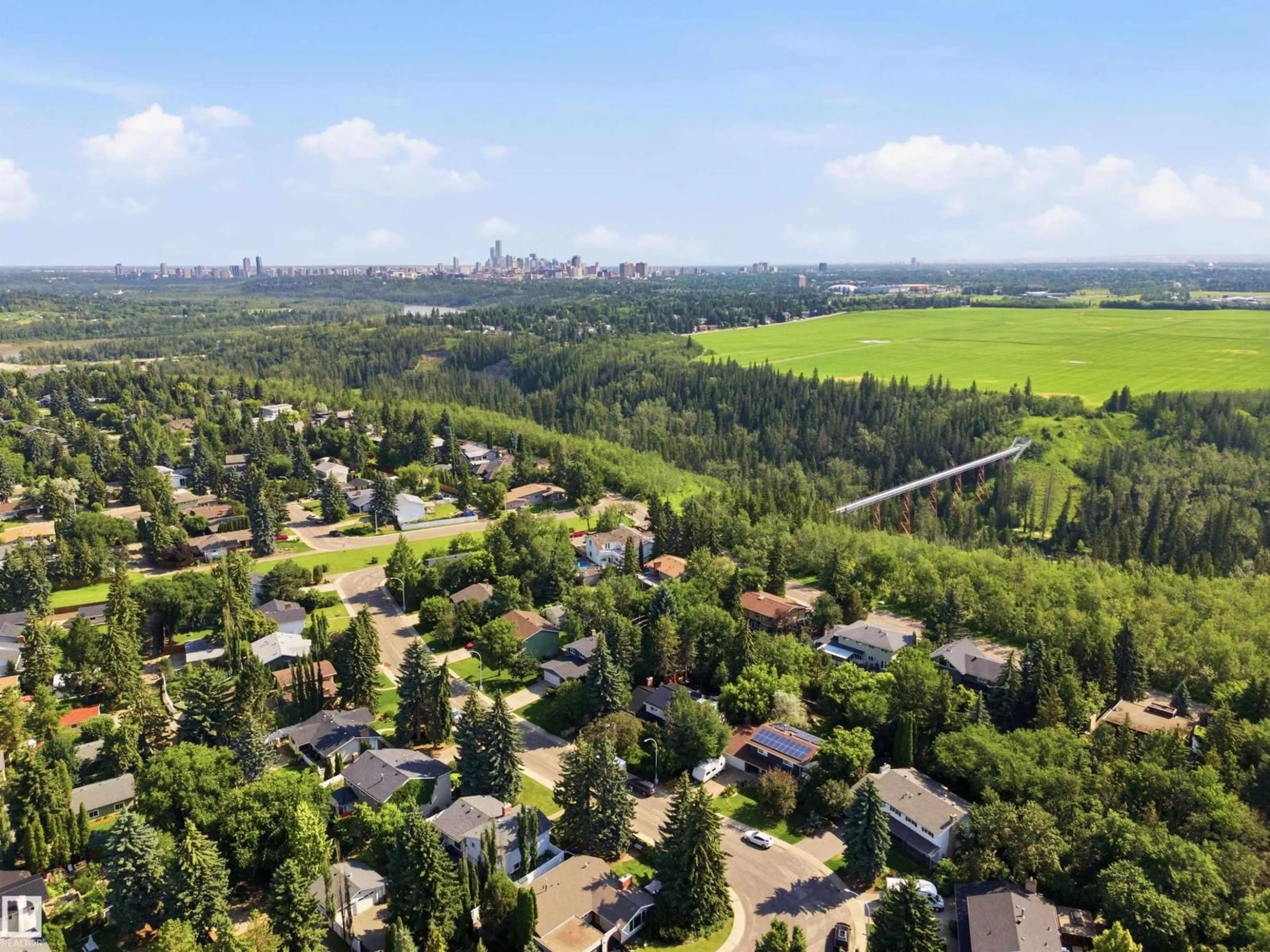 A pic from outside/outdoor area/front of a property/back of a property/a pic from drone, forest/trees view for 14307 50 AV, Edmonton Alberta T6H0K2