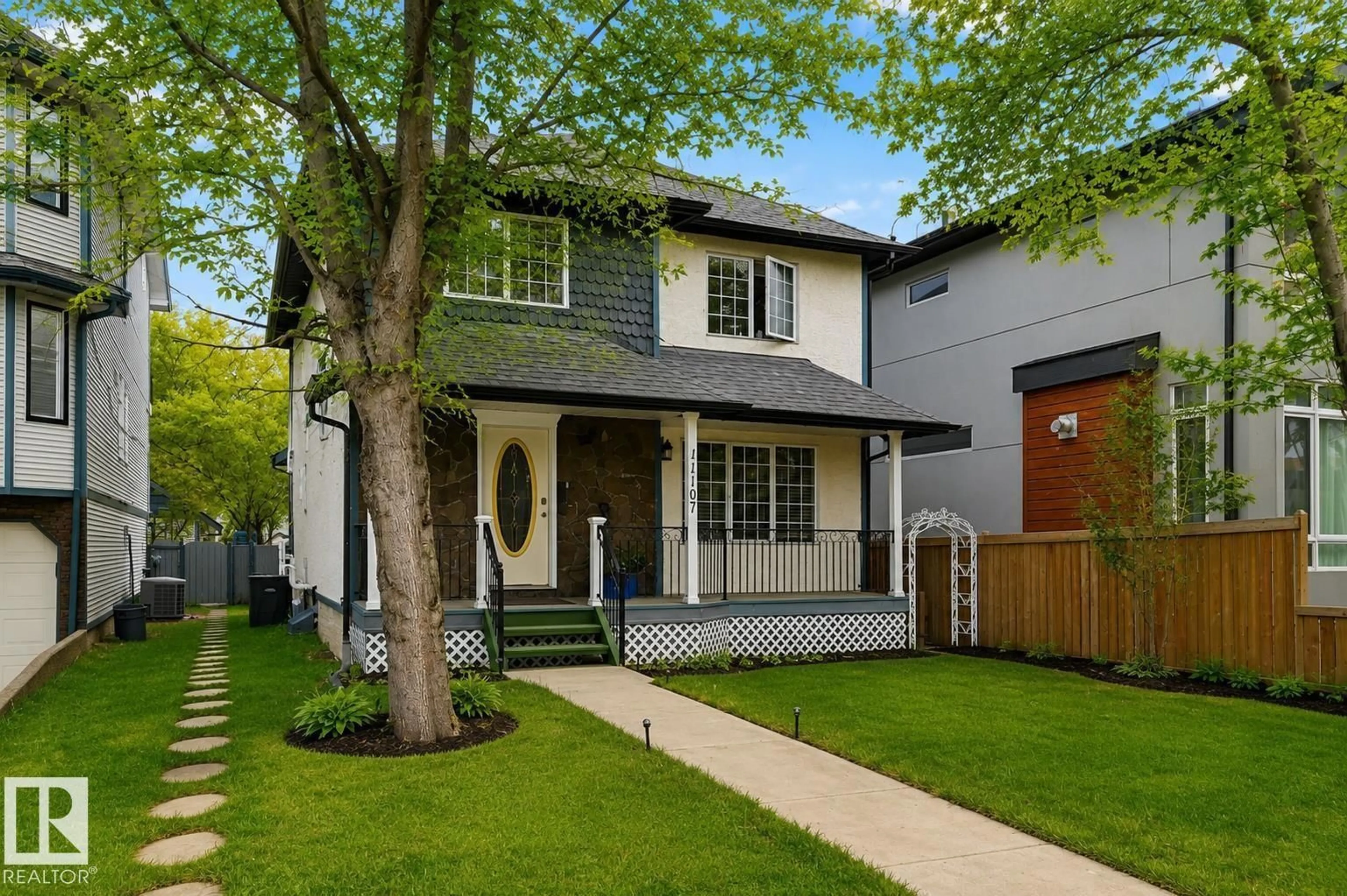 Home with vinyl exterior material, street for 11107 UNIVERSITY AV, Edmonton Alberta T6G1Y5