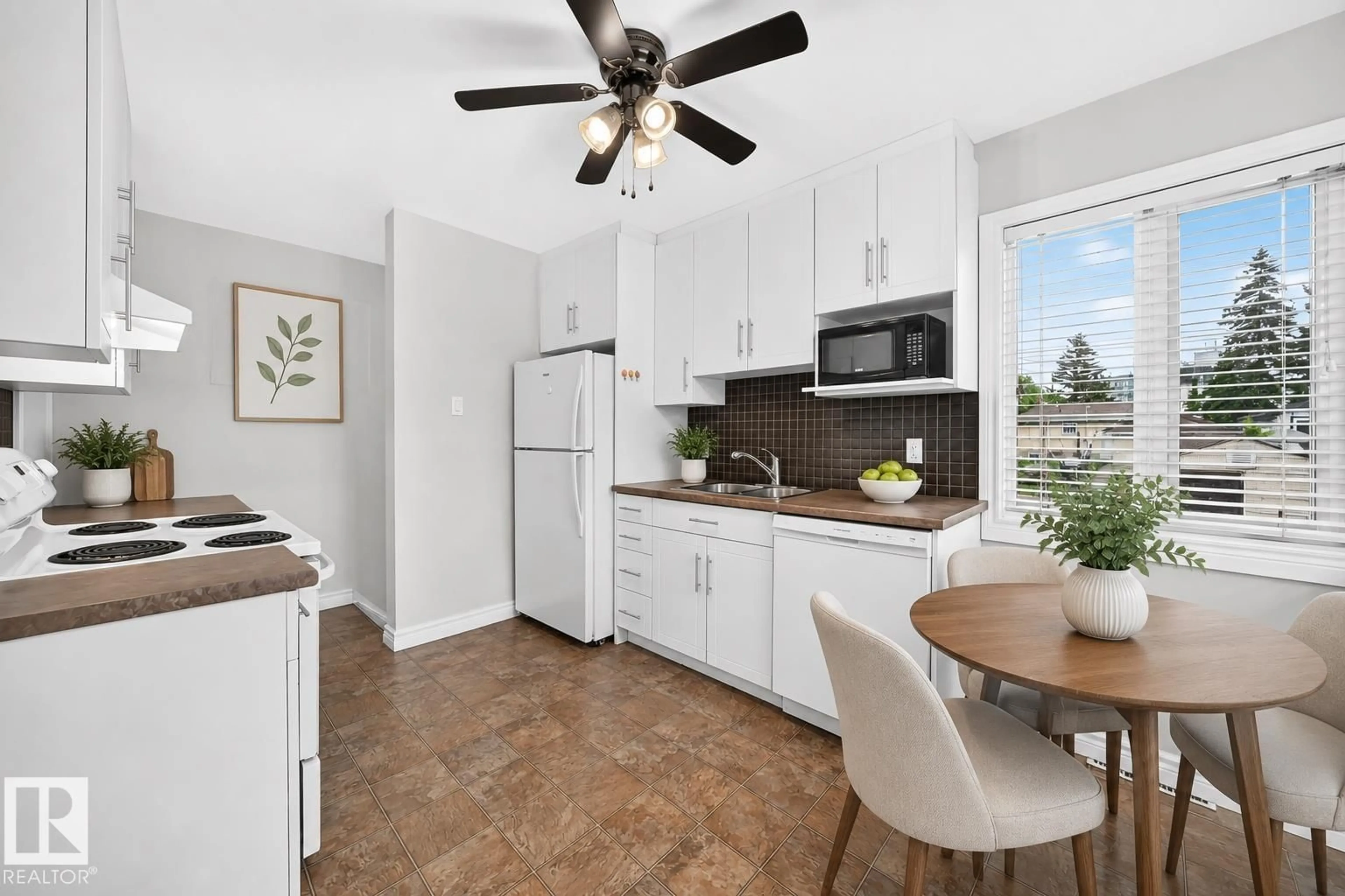 Open concept kitchen, ceramic/tile floor for NW - 7307 76 ST, Edmonton Alberta T6C0G5