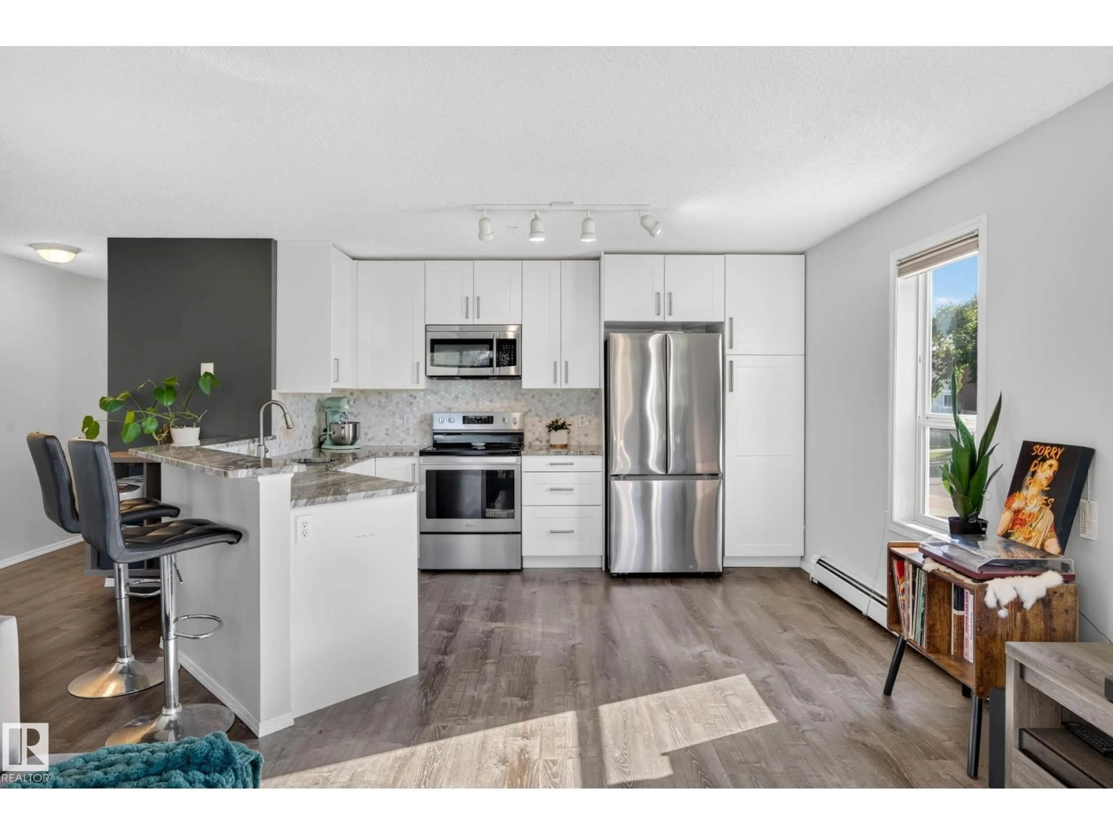 Open concept kitchen, unknown for #204 - 11104 109 AV, Edmonton Alberta T5H1E1