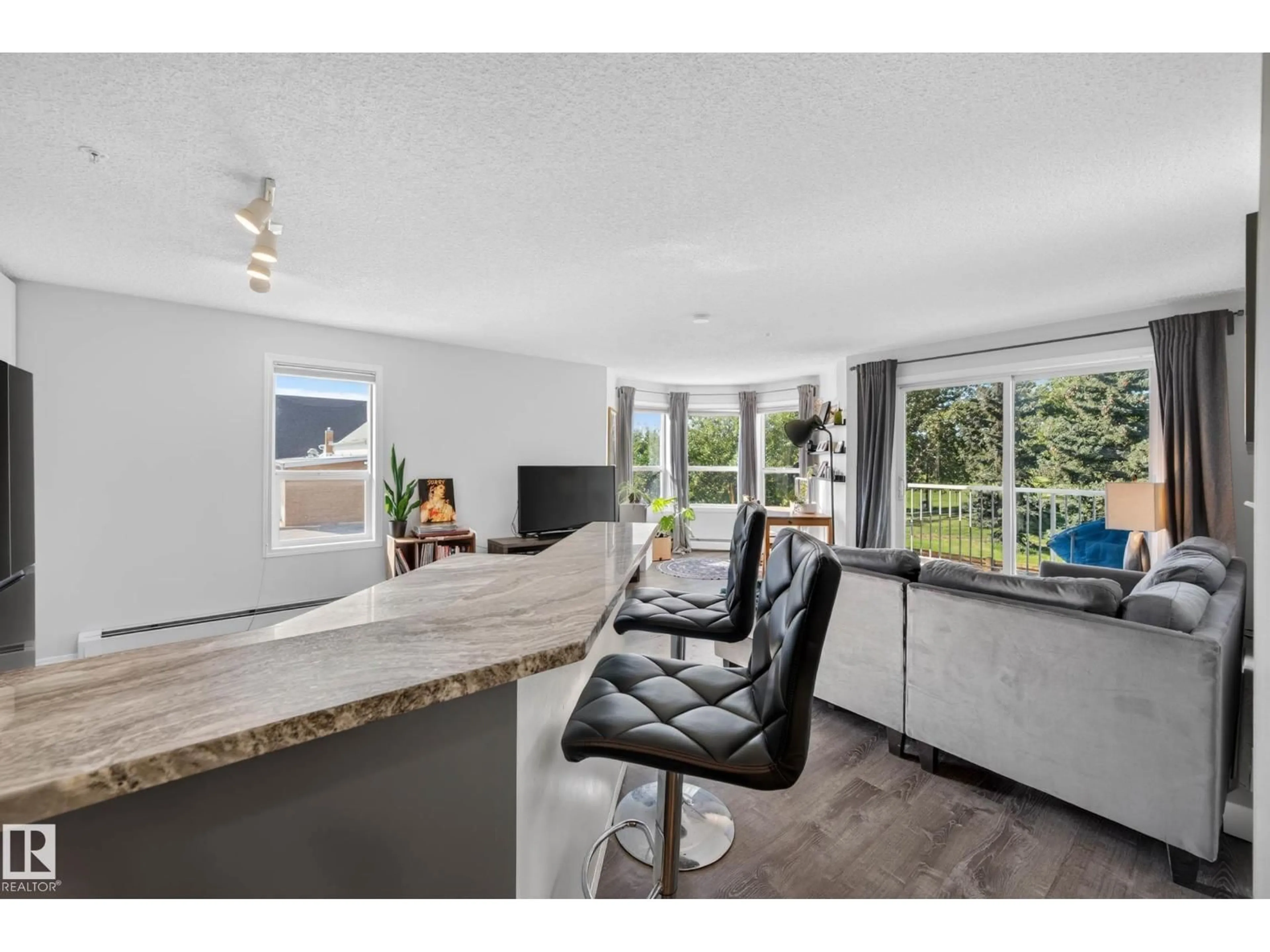 Open concept kitchen, unknown for #204 - 11104 109 AV, Edmonton Alberta T5H1E1