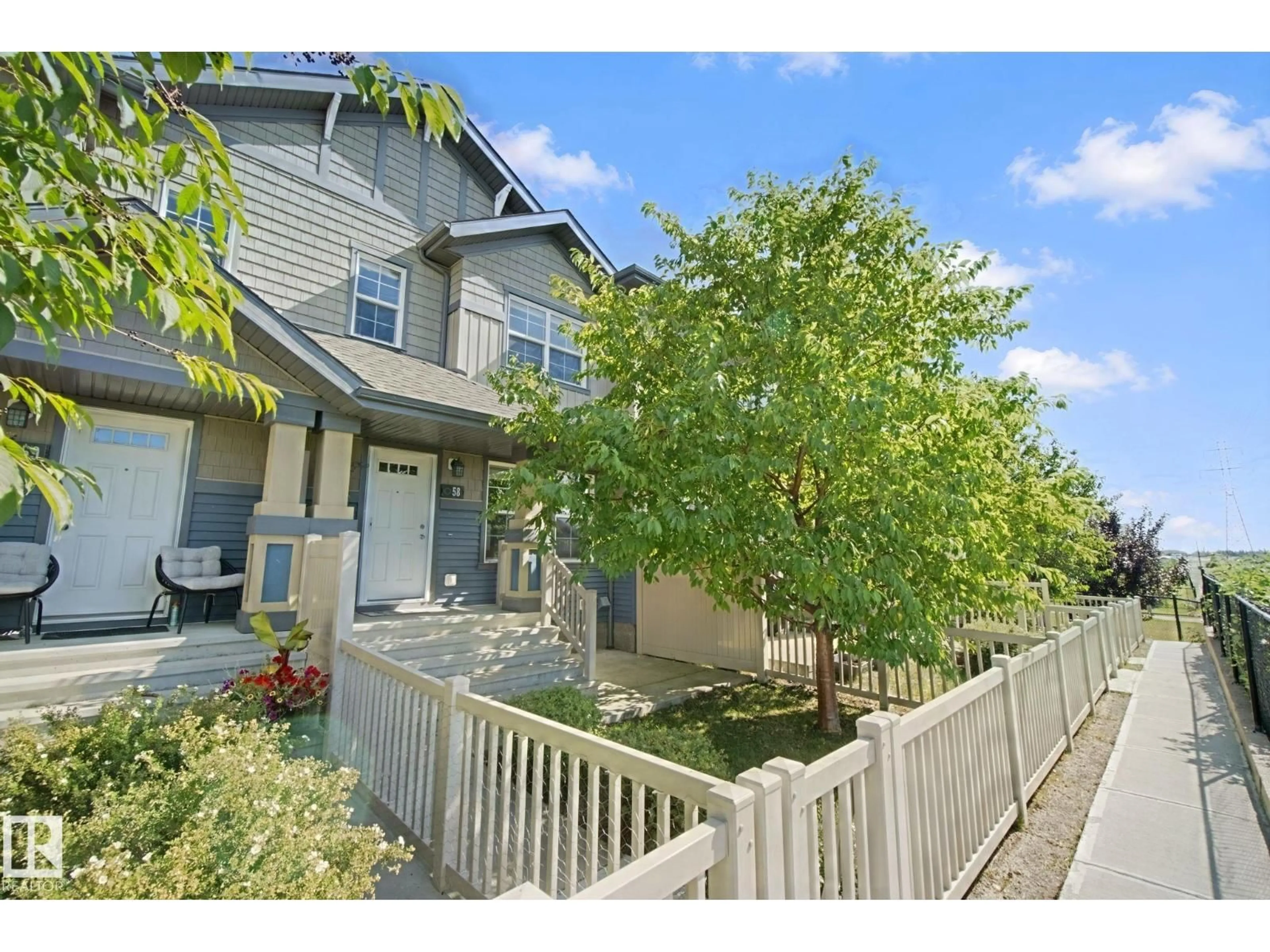 A pic from outside/outdoor area/front of a property/back of a property/a pic from drone, street for 58 - 4029 ORCHARDS DR, Edmonton Alberta T6X1V2