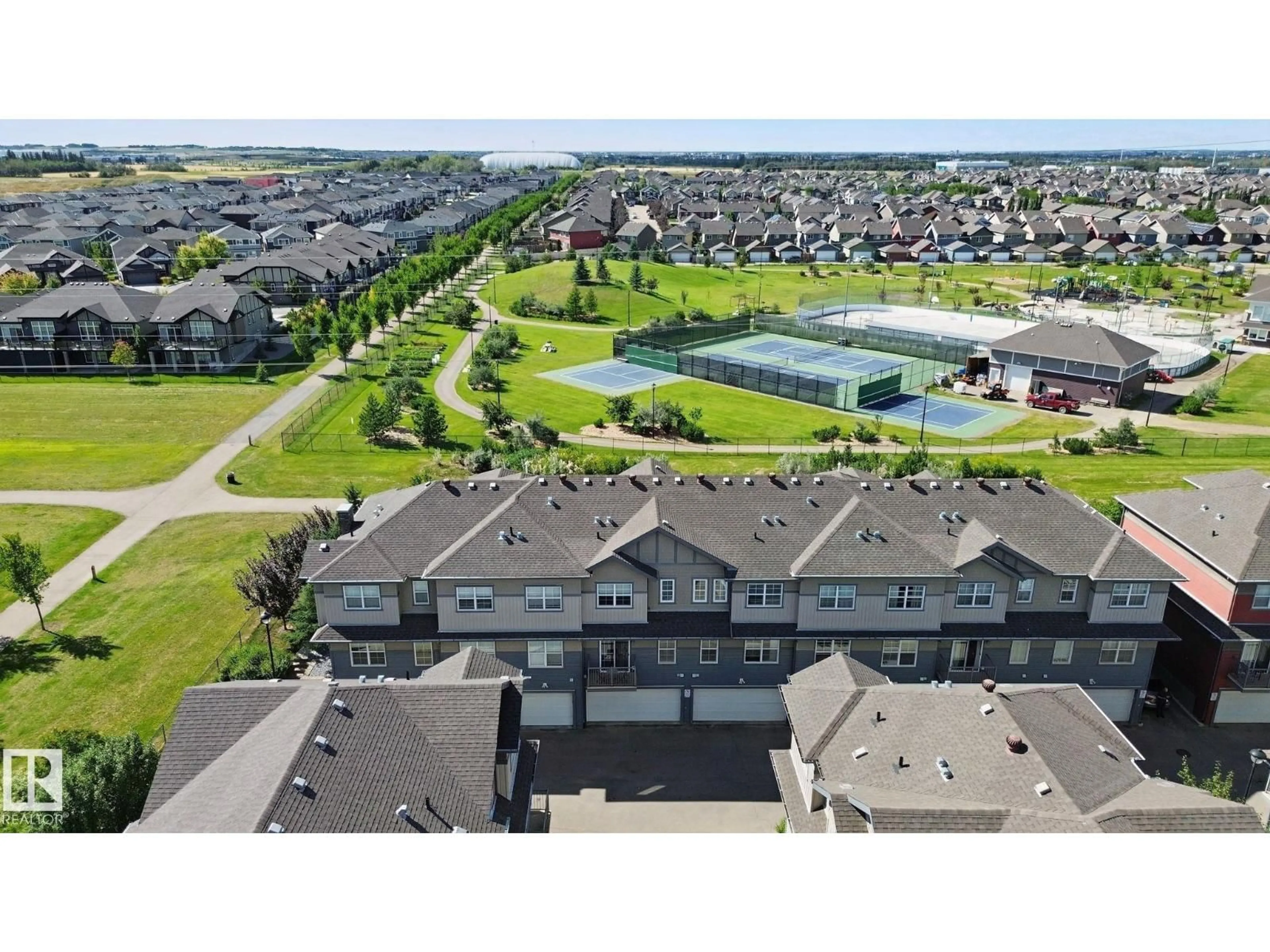 A pic from outside/outdoor area/front of a property/back of a property/a pic from drone, unknown for 58 - 4029 ORCHARDS DR, Edmonton Alberta T6X1V2