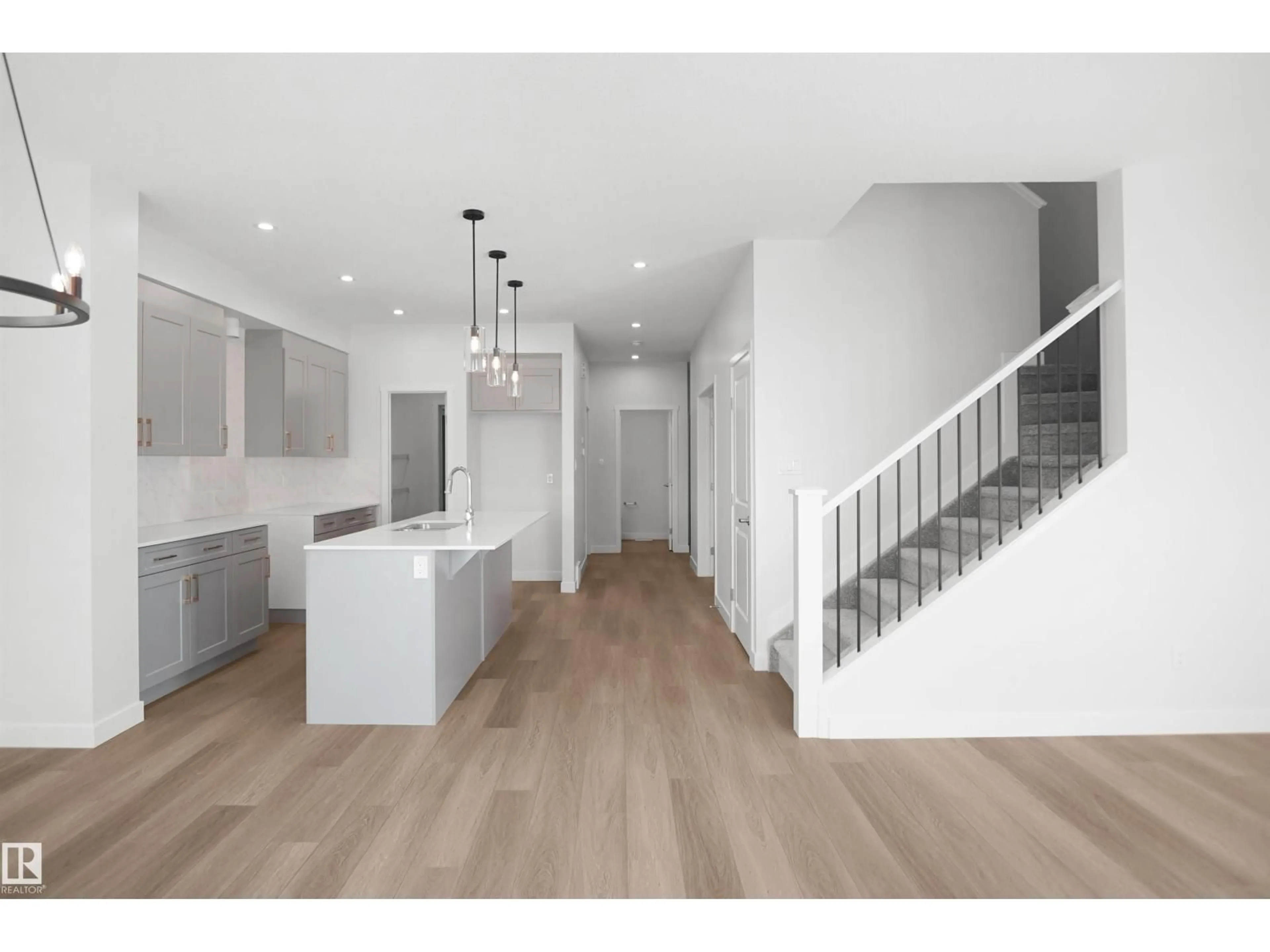 Open concept kitchen, wood/laminate floor for 9709 CARSON PL, Edmonton Alberta T6W5P9