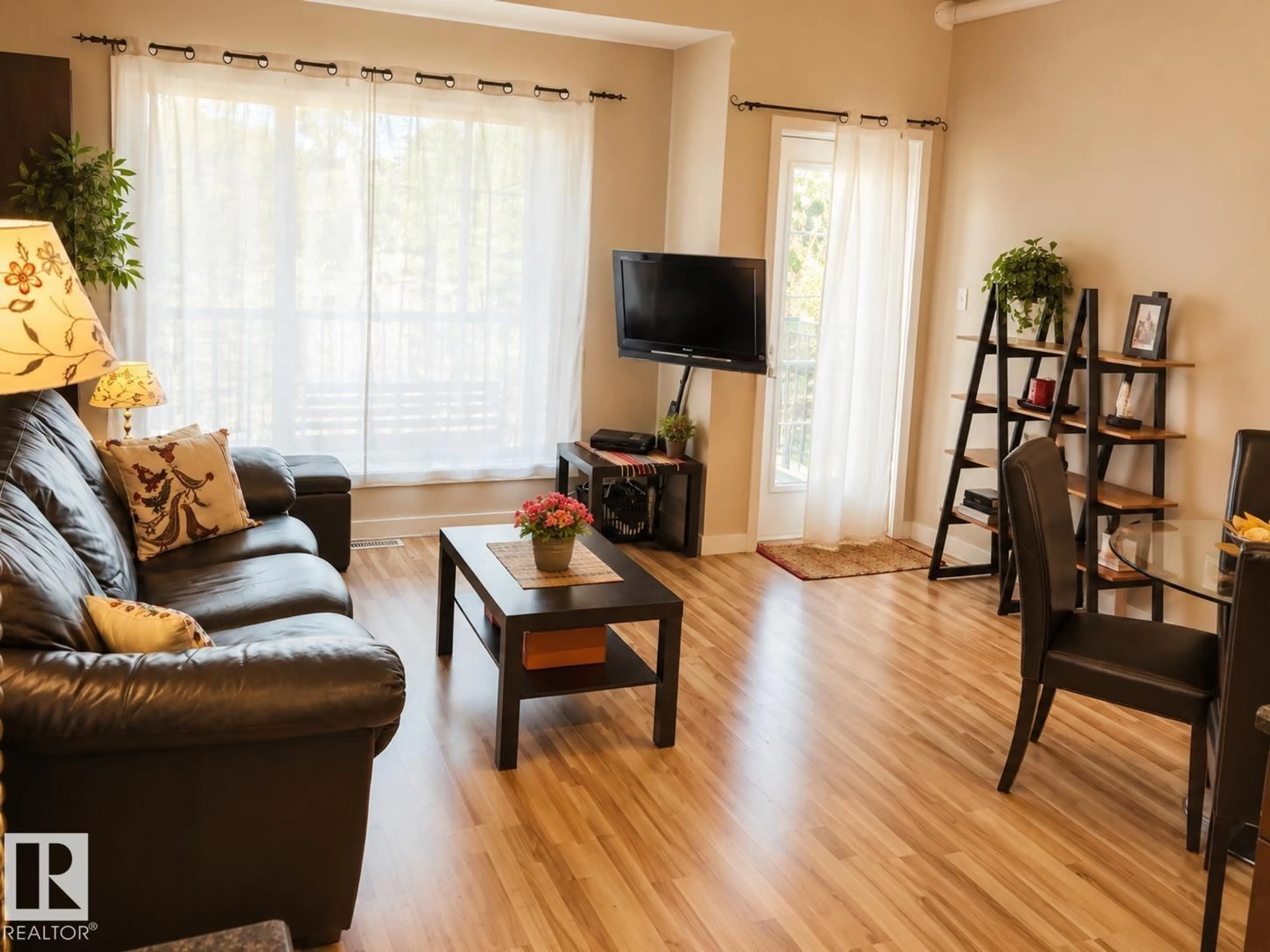 Living room with furniture, wood/laminate floor for #3 - 11811 106 ST NW, Edmonton Alberta T5G2R2