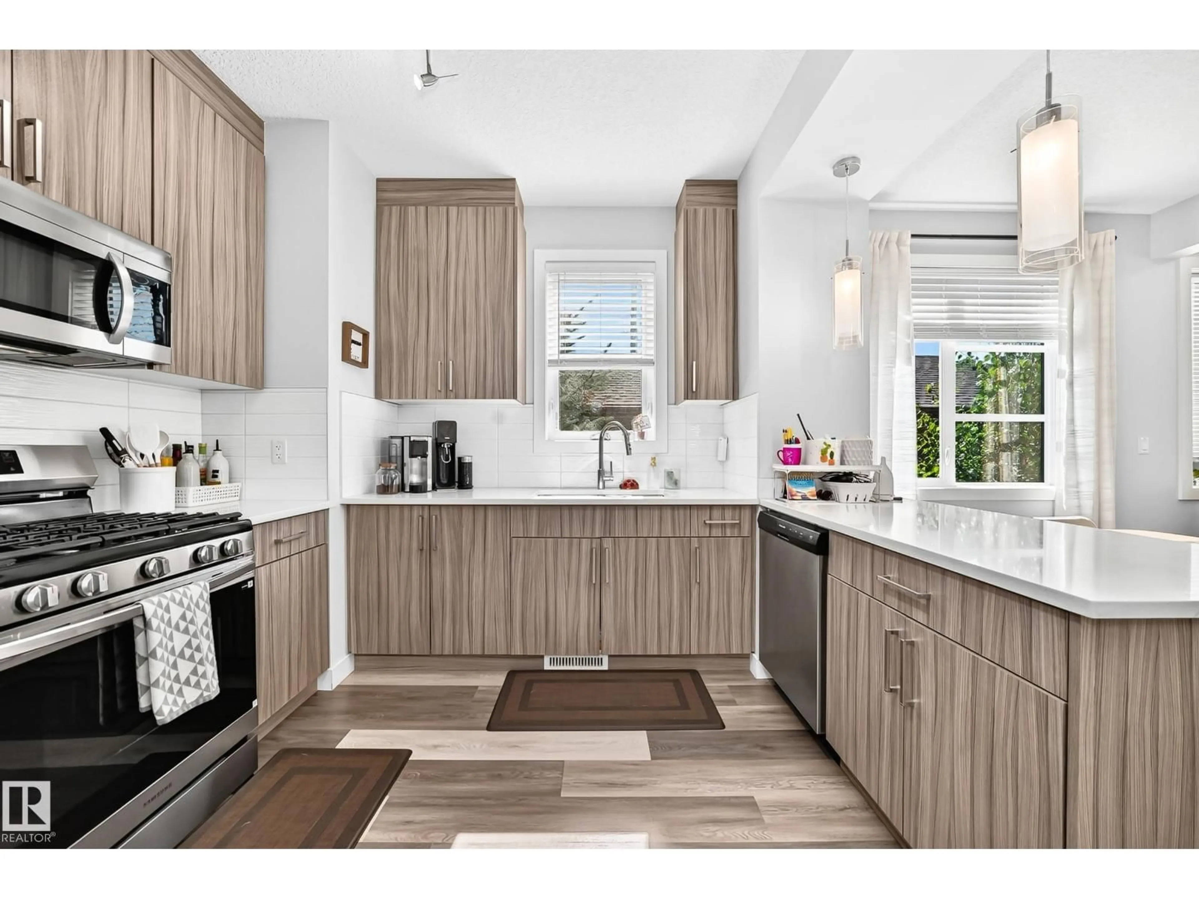 Open concept kitchen, unknown for NW - 7513 89 ST, Edmonton Alberta T6C0J4