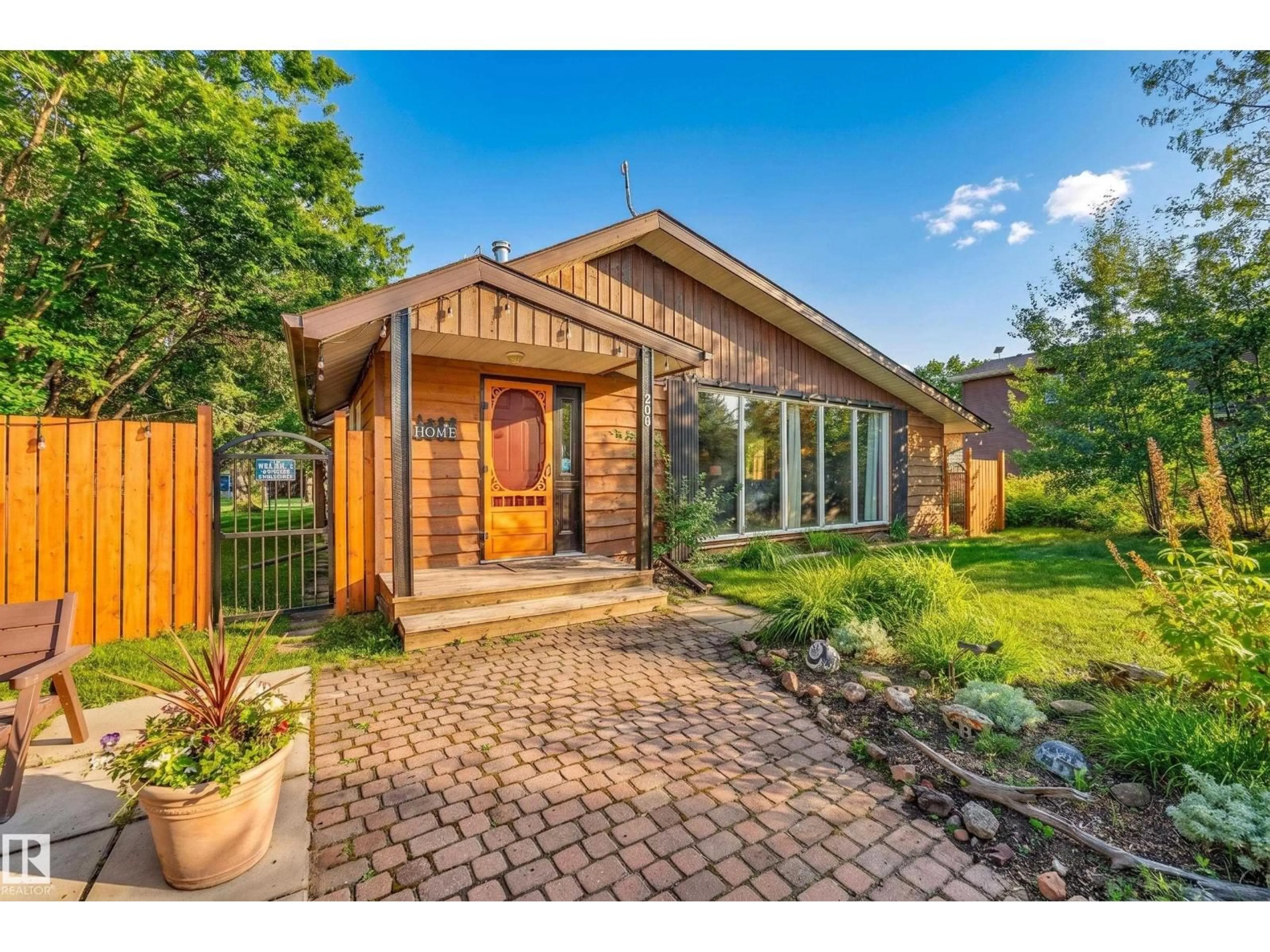 Home with brick exterior material, street for 208 1 AV, Rural Wetaskiwin County Alberta T0C1X0