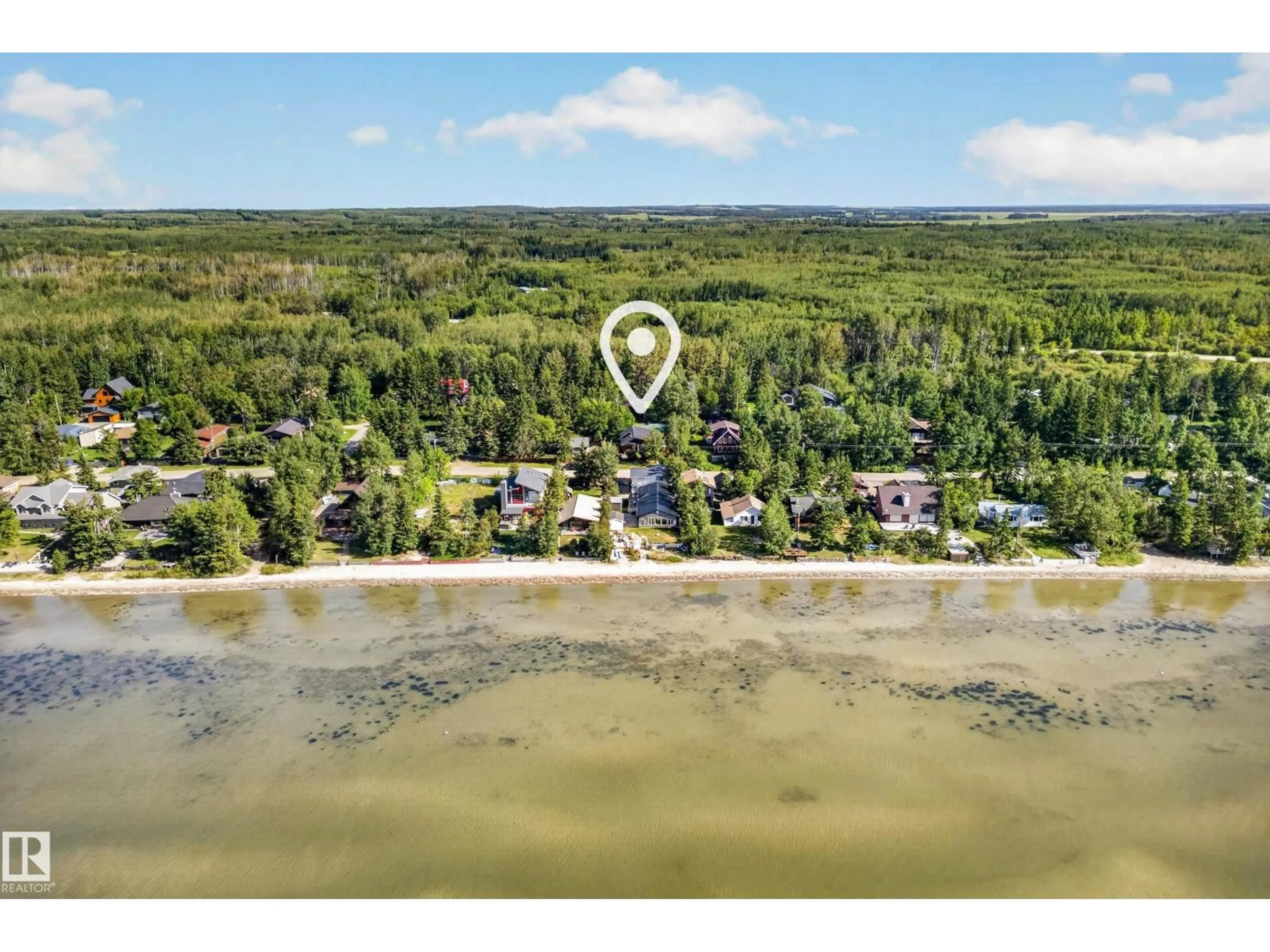 A pic from outside/outdoor area/front of a property/back of a property/a pic from drone, water/lake/river/ocean view for 208 1 AV, Rural Wetaskiwin County Alberta T0C1X0